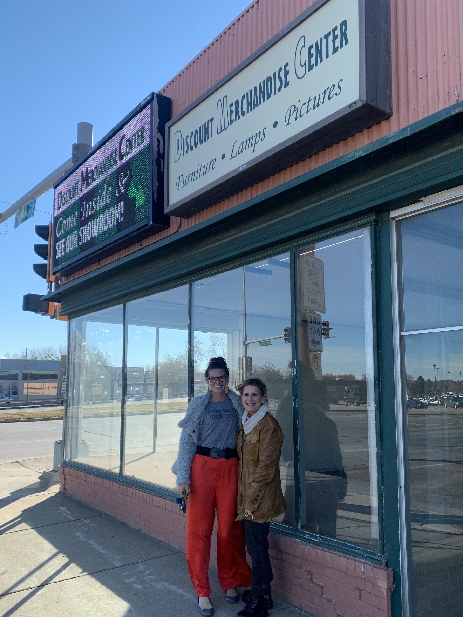 women outside a store