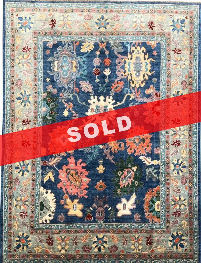 A rug with a detailed pattern on it.