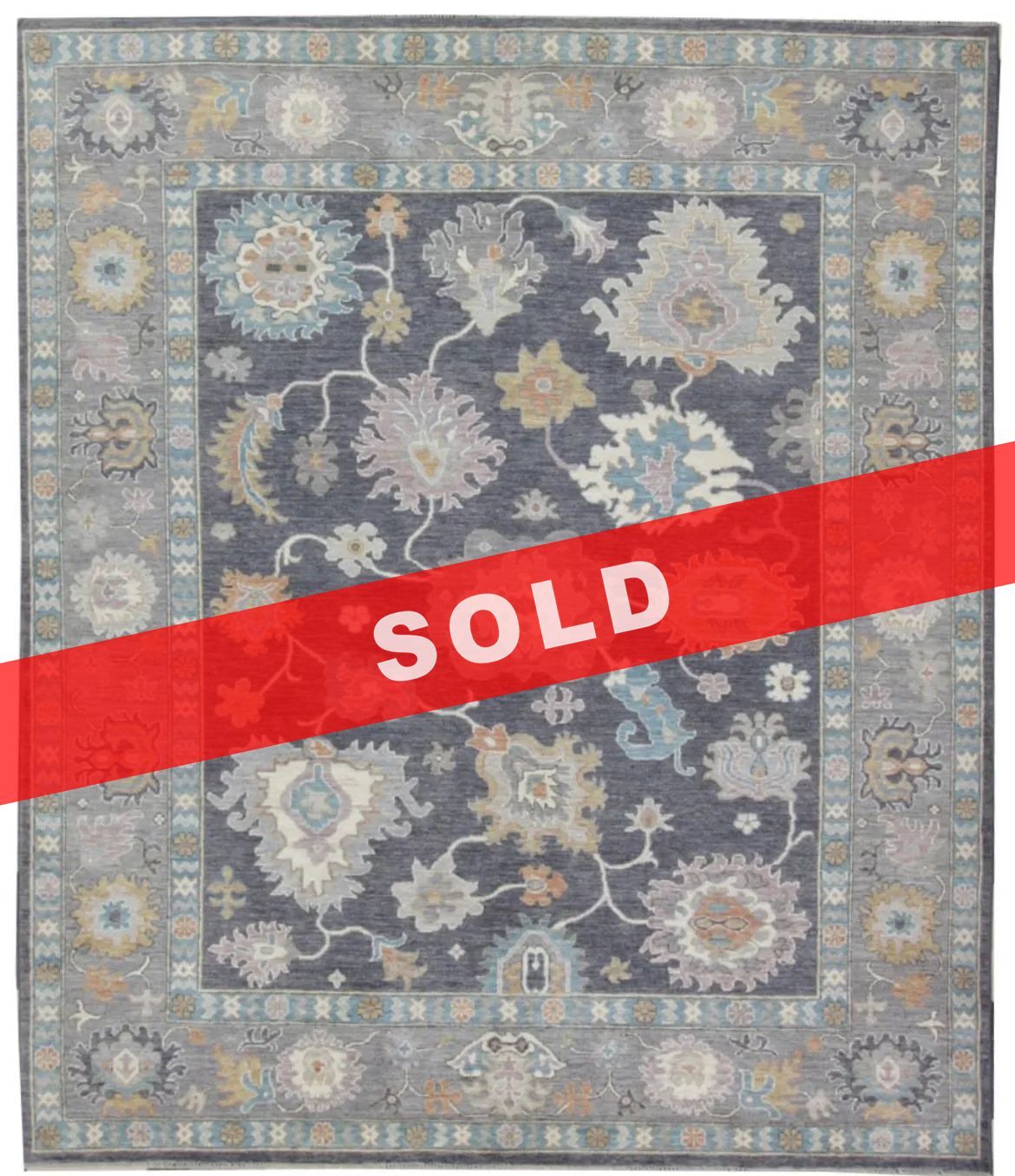 A rug with a detailed pattern on it.