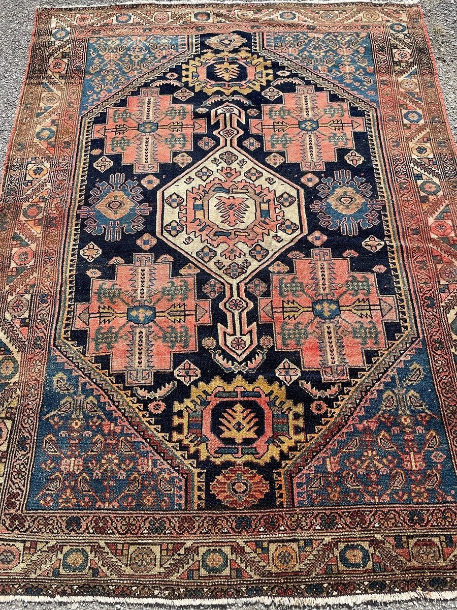A rug with a detailed pattern on it.
