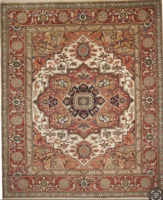 A rug with a detailed pattern on it.