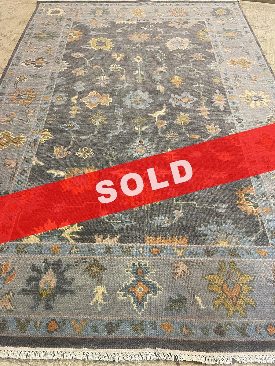 A rug with a detailed pattern on it.