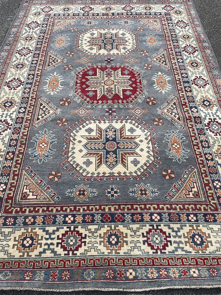 A rug with a detailed pattern on it.