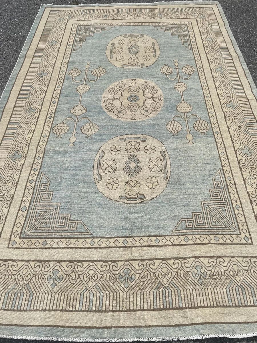 A rug with a detailed pattern on it.