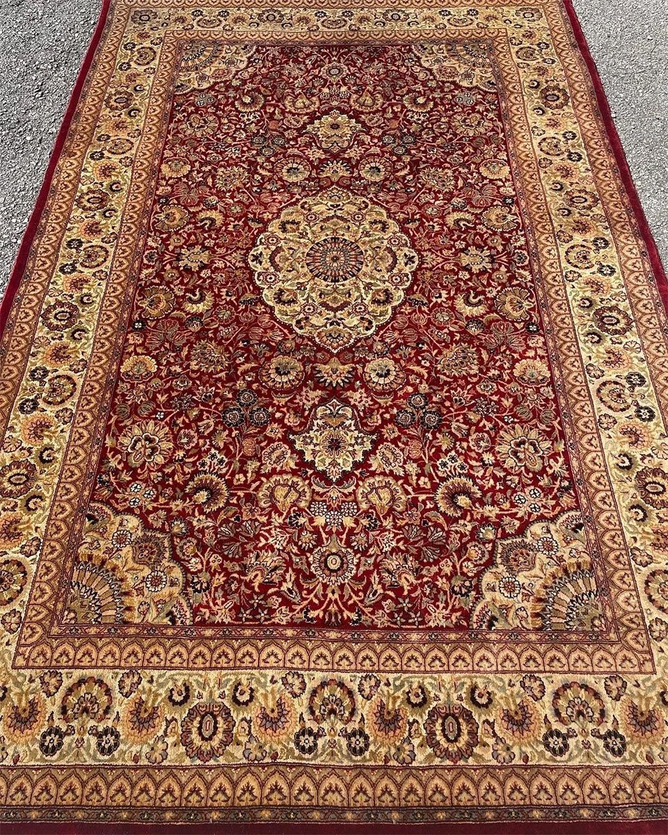 A rug with a detailed pattern on it.