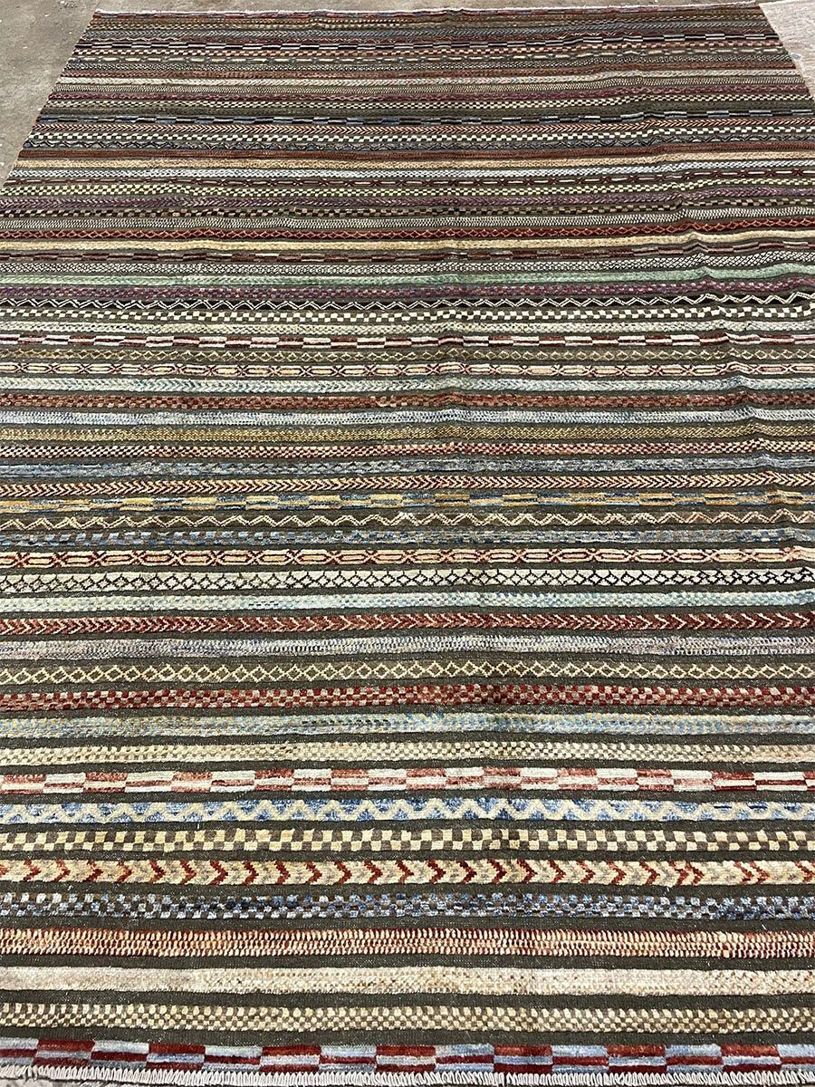 A rug with a detailed pattern on it.