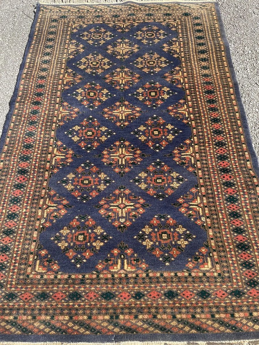A rug with a detailed pattern on it.