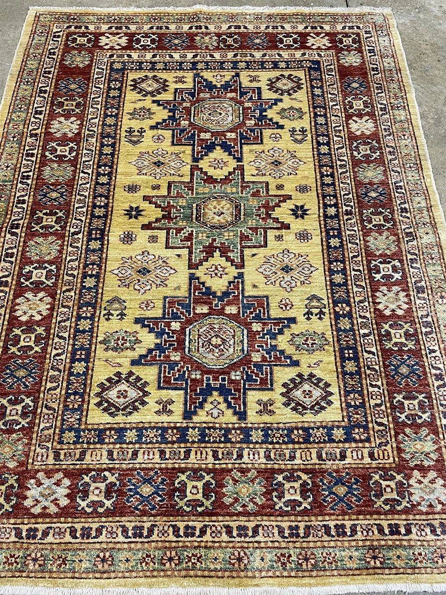 A rug with a detailed pattern on it.