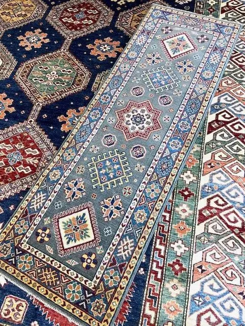 A rug with a detailed pattern on it.