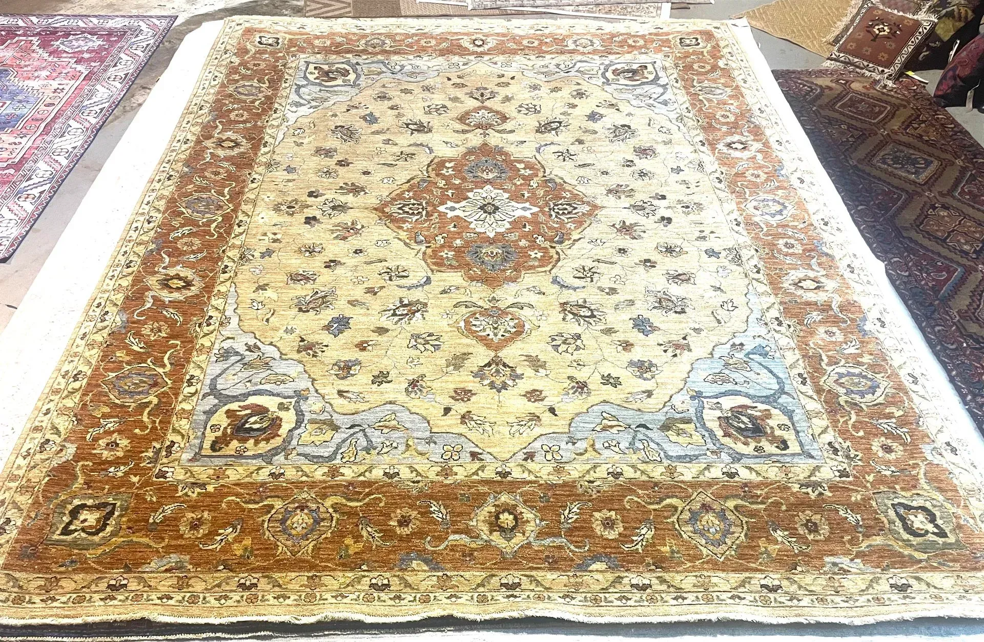 A rug with a detailed pattern on it.