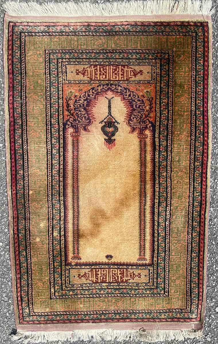 A rug with a detailed pattern on it.