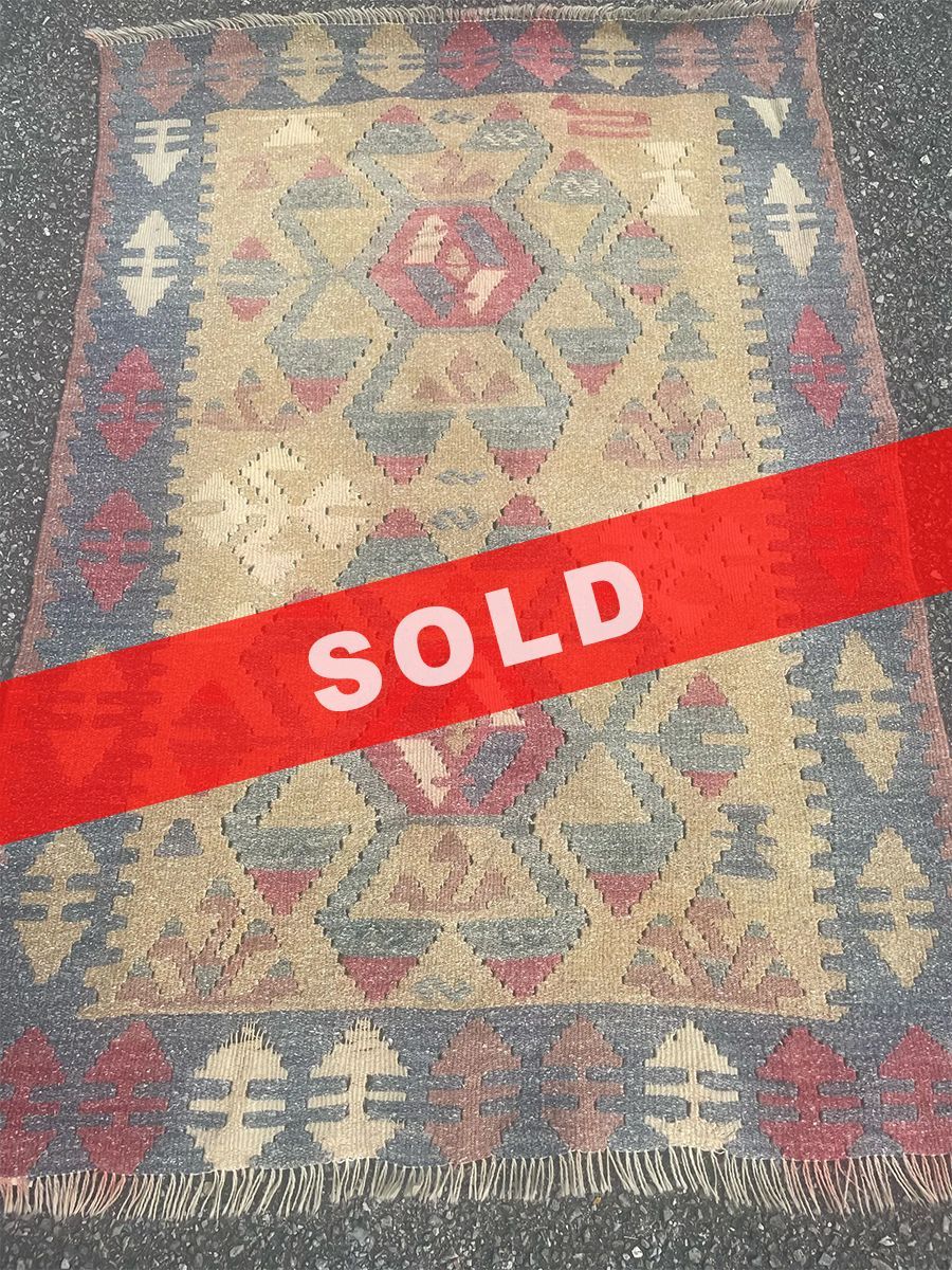 A rug with a detailed pattern on it.