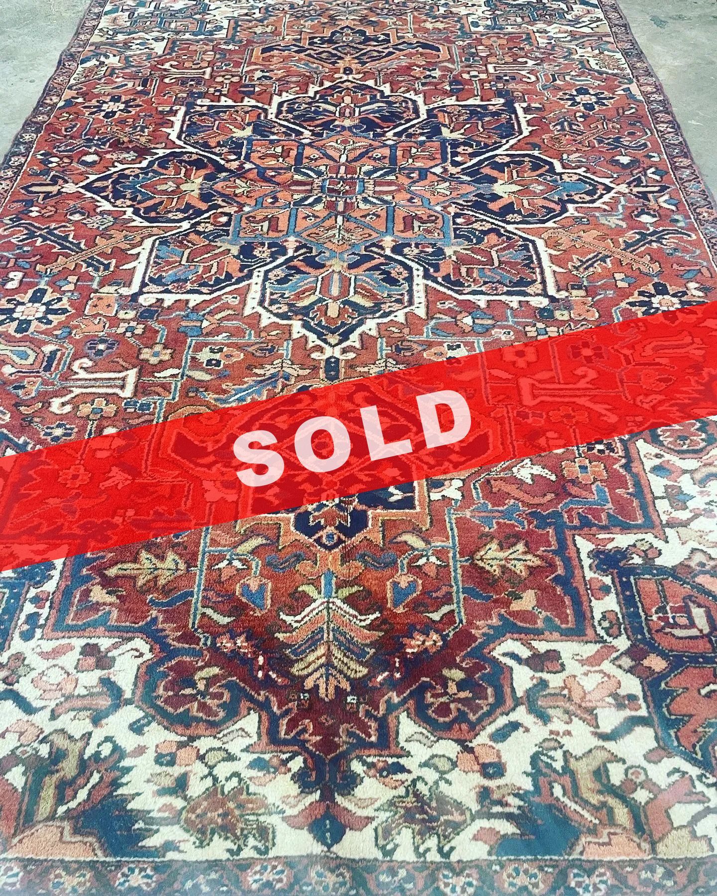 A rug with a detailed pattern on it.