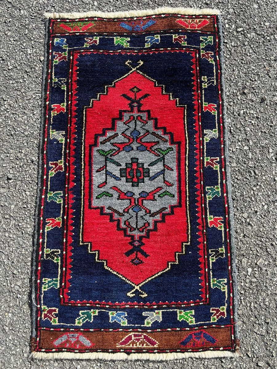 A rug with a detailed pattern on it.