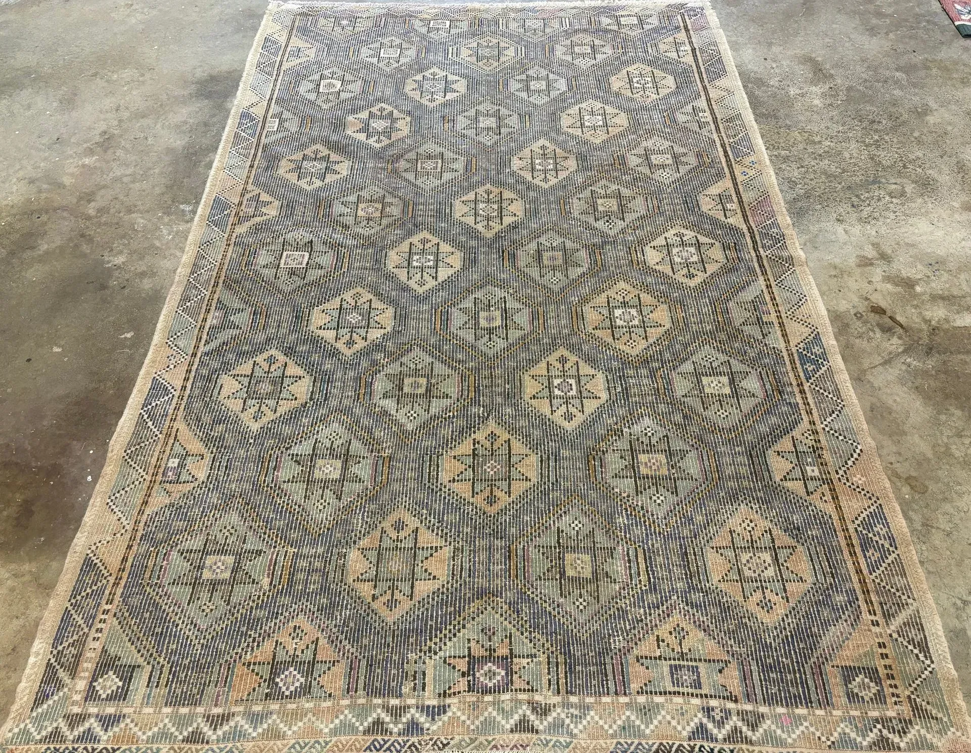 A rug with a detailed pattern on it.