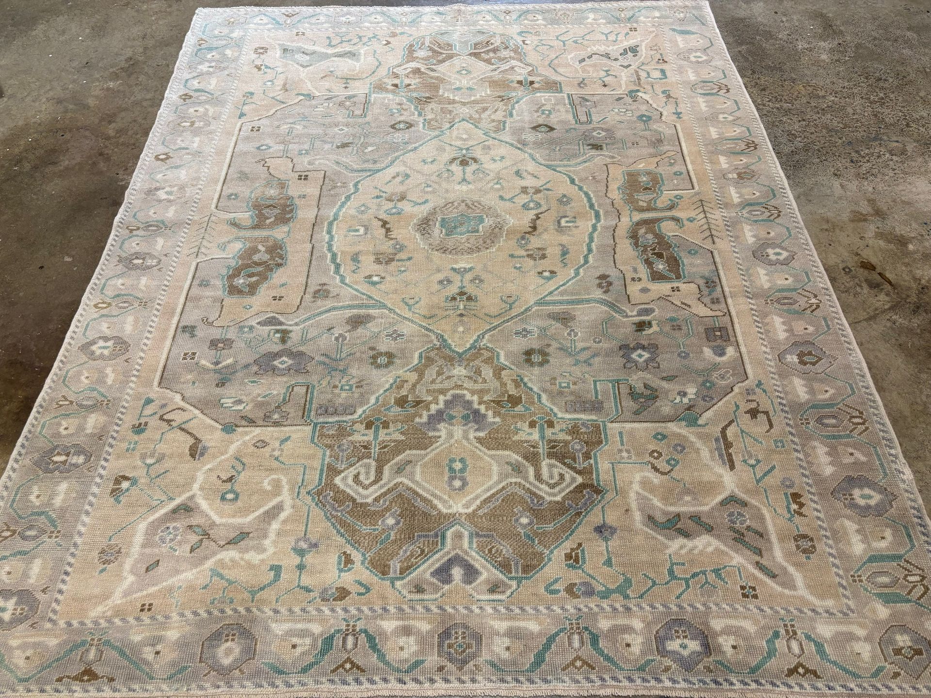 A rug with a detailed pattern on it.