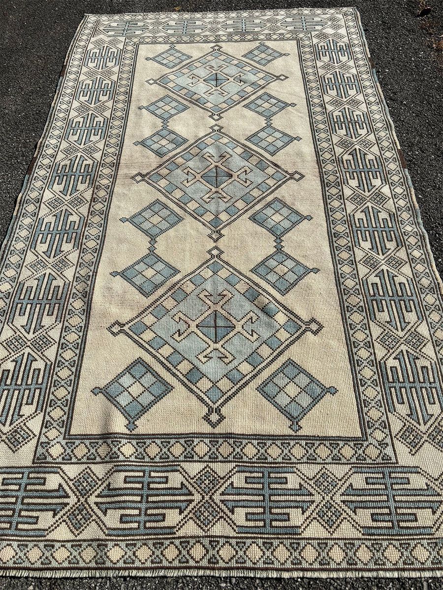 A rug with a detailed pattern on it.
