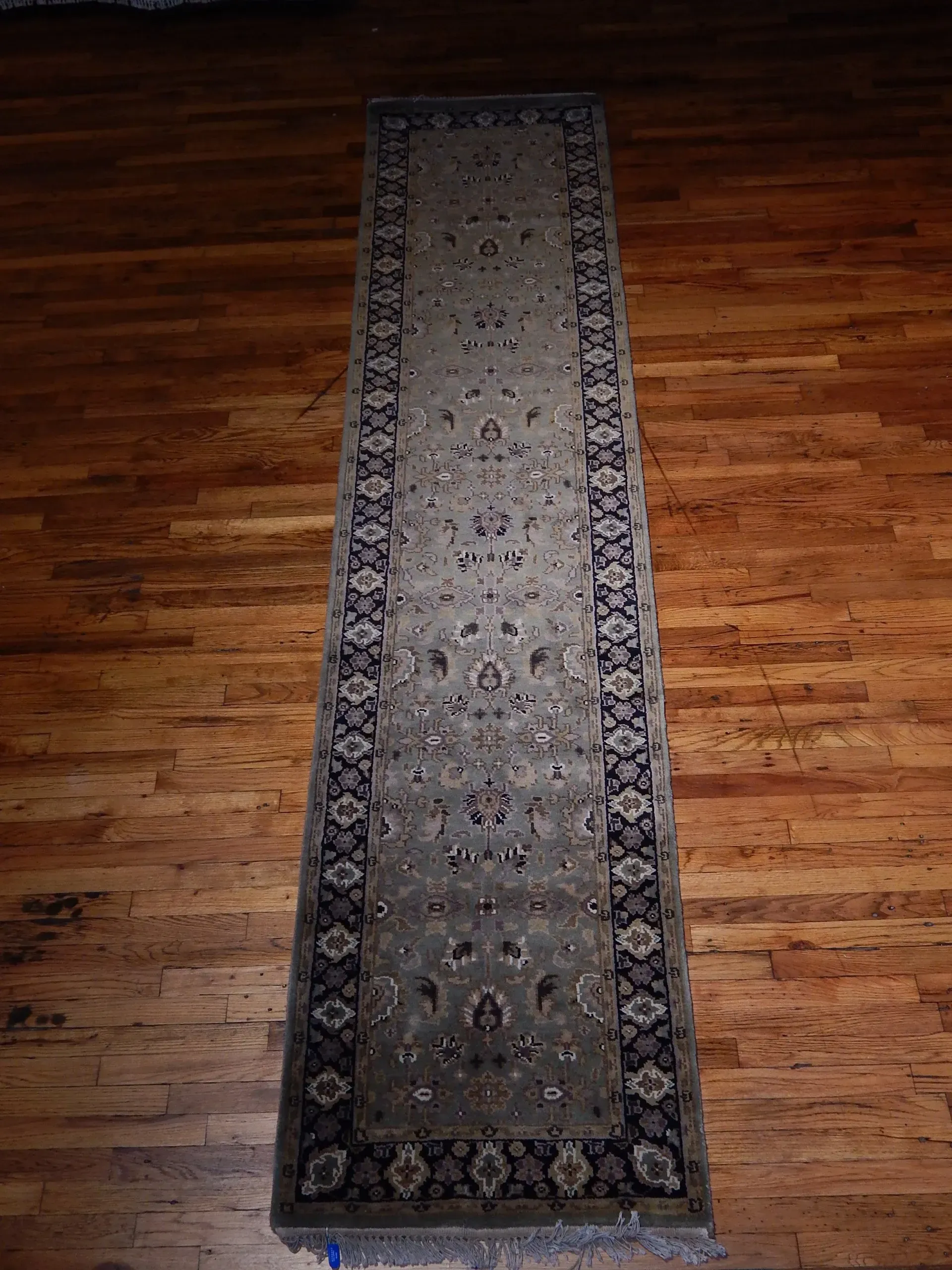 A rug with a detailed pattern on it.