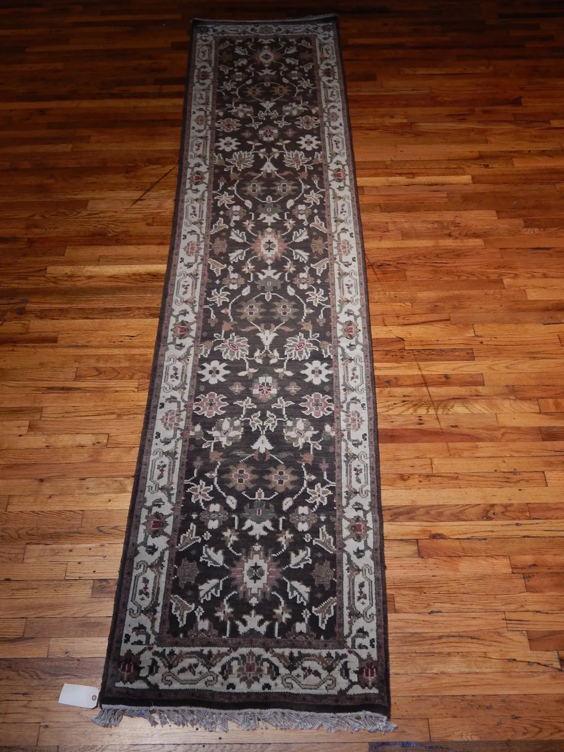 A rug with a detailed pattern on it.