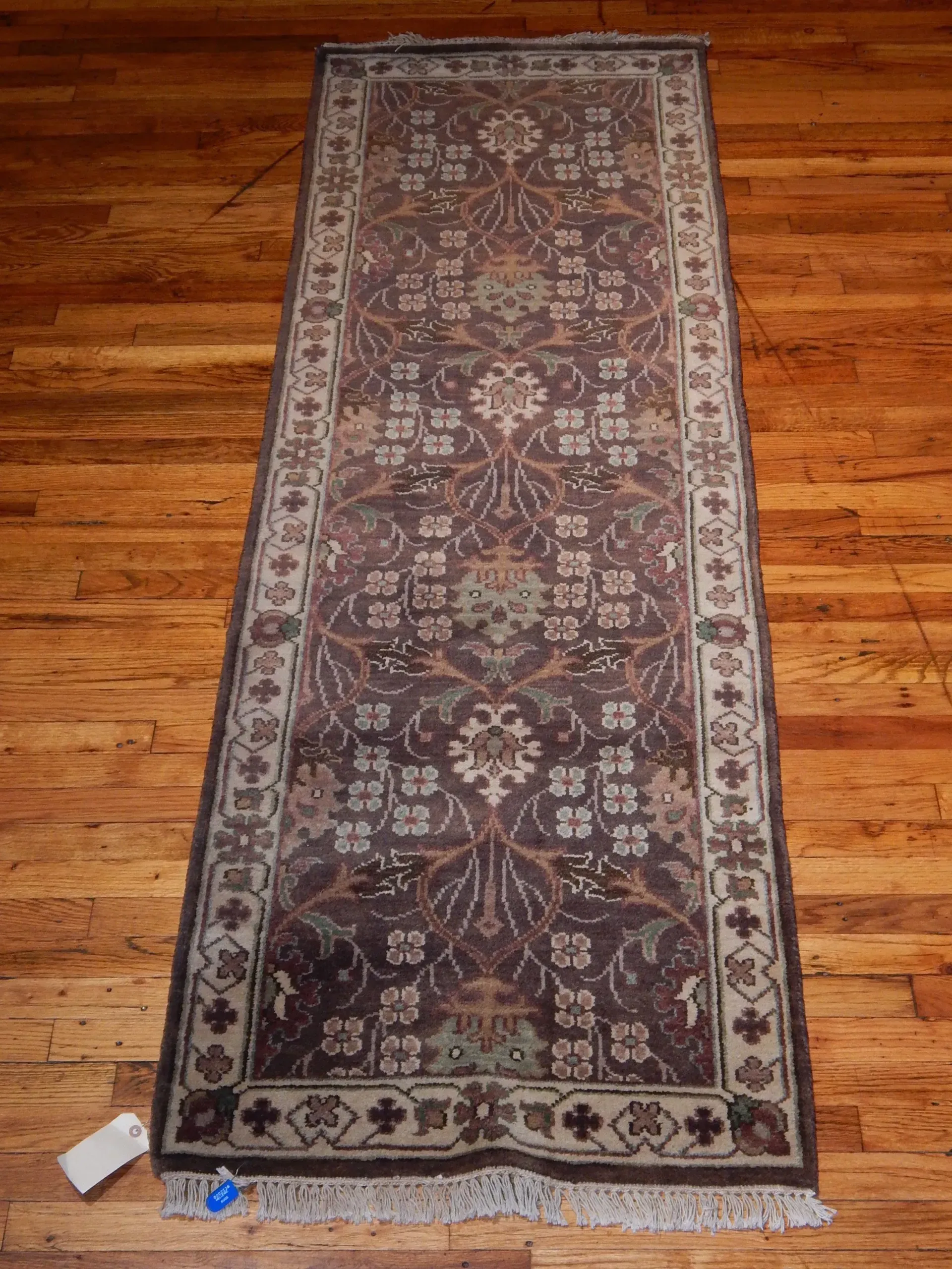 A rug with a detailed pattern on it.