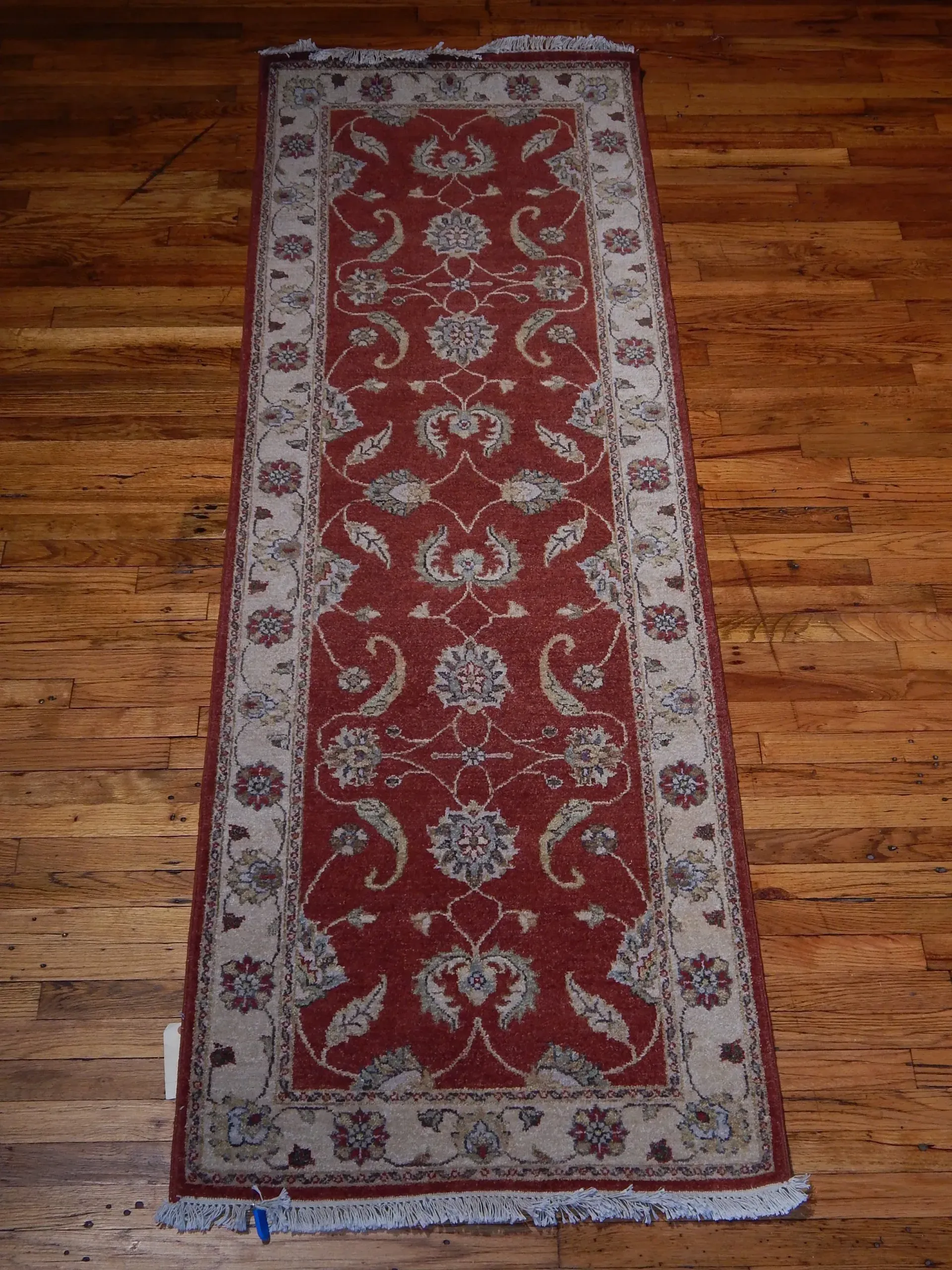 A rug with a detailed pattern on it.