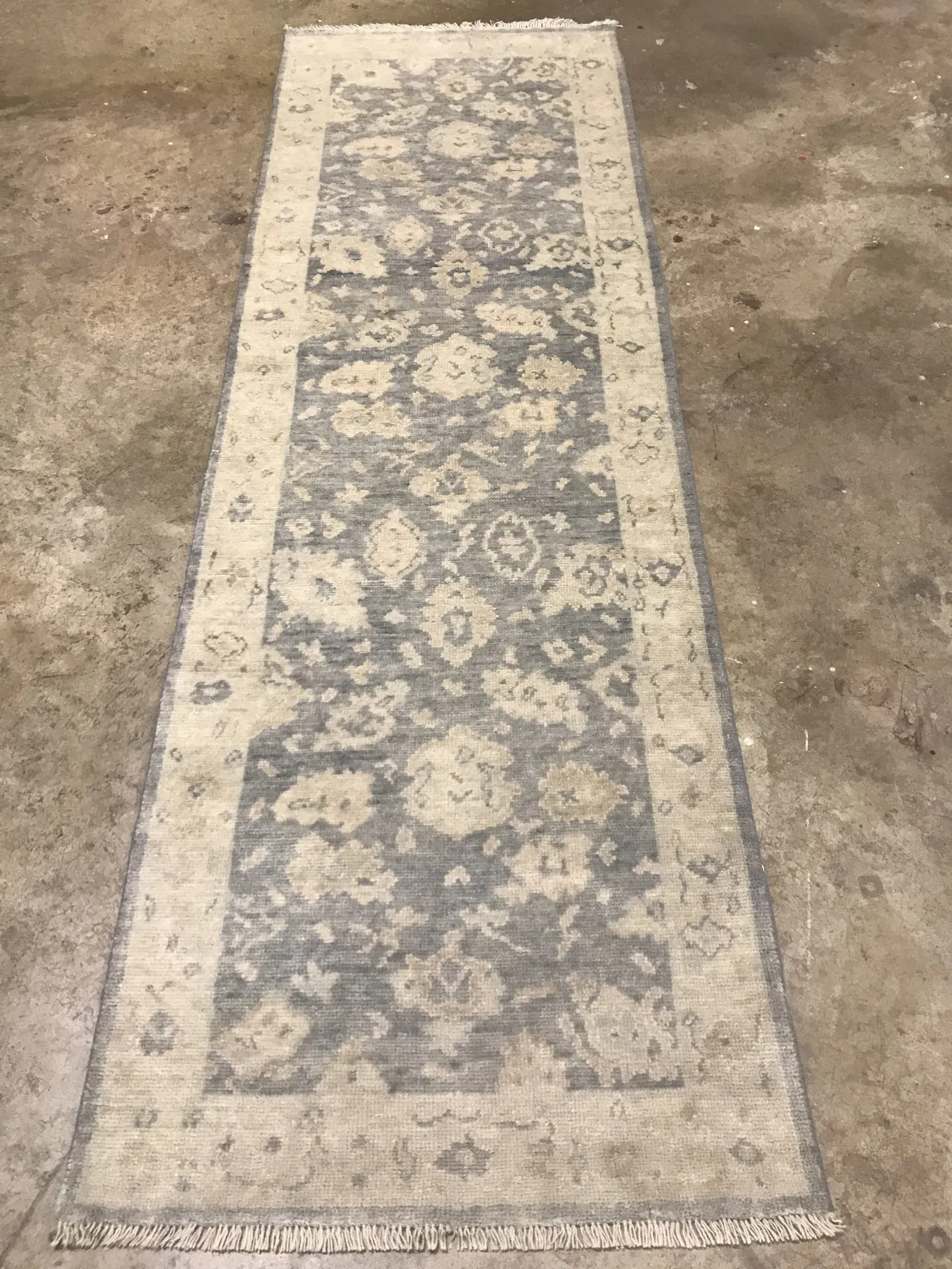 A rug with a detailed pattern on it.