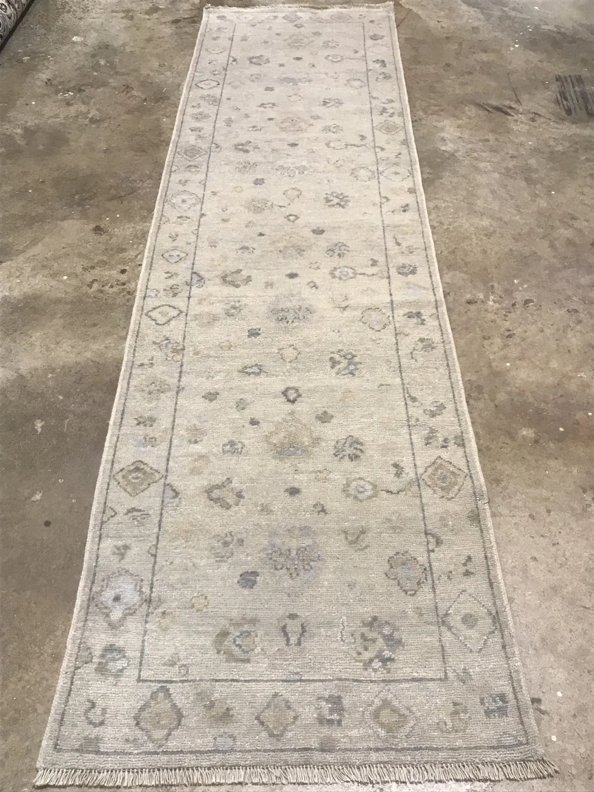 A rug with a detailed pattern on it.