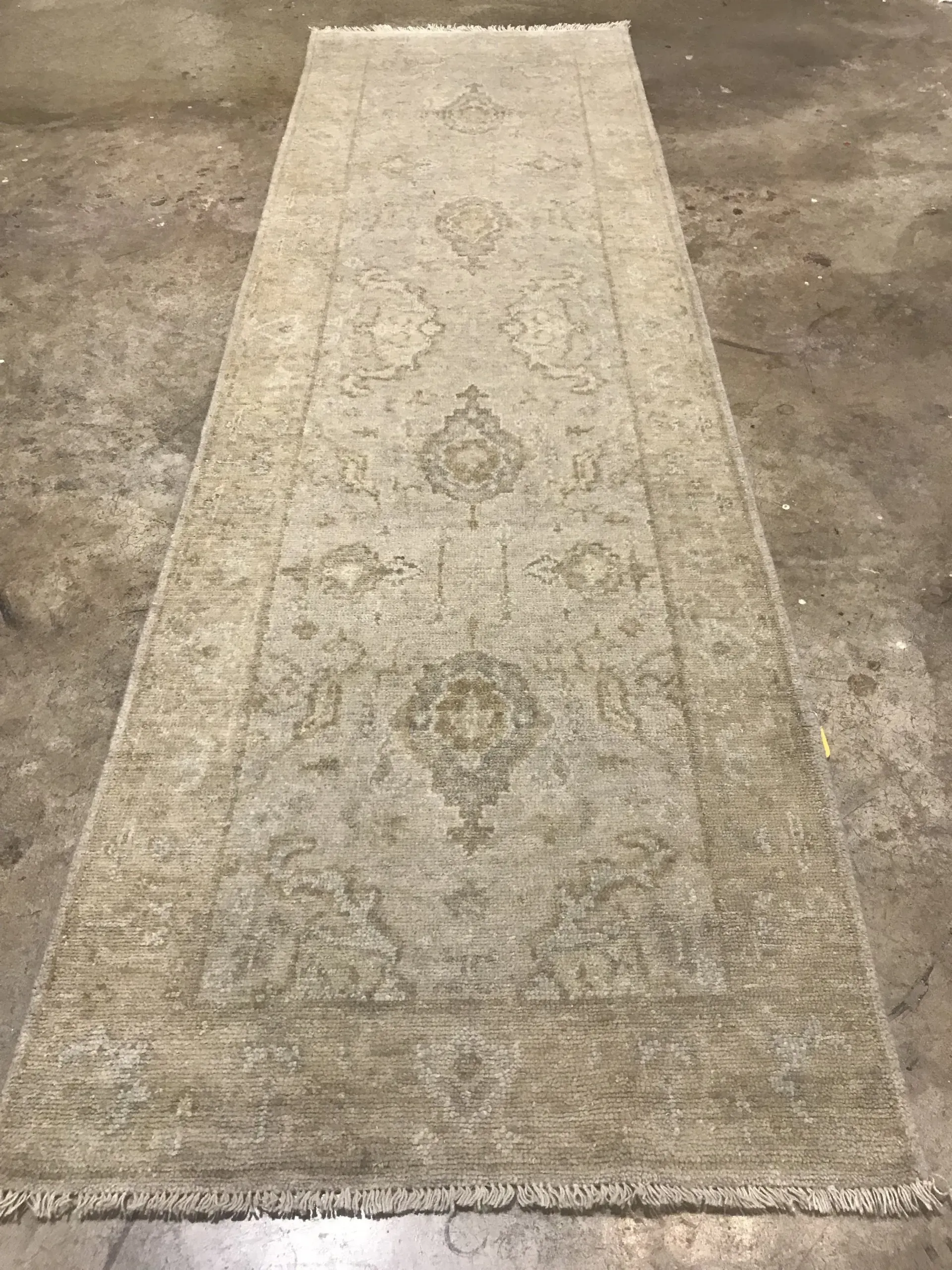 A rug with a detailed pattern on it.