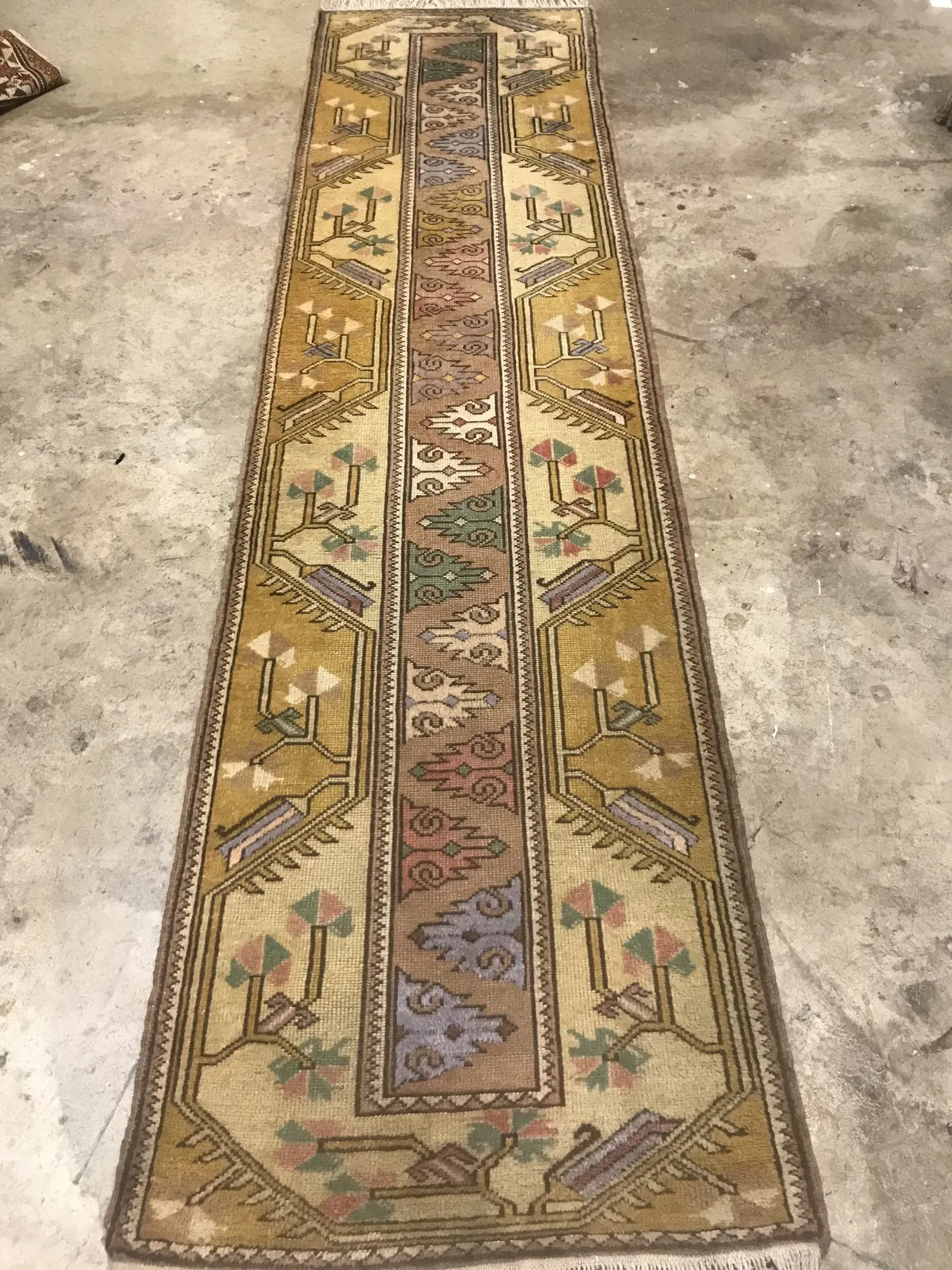A rug with a detailed pattern on it.