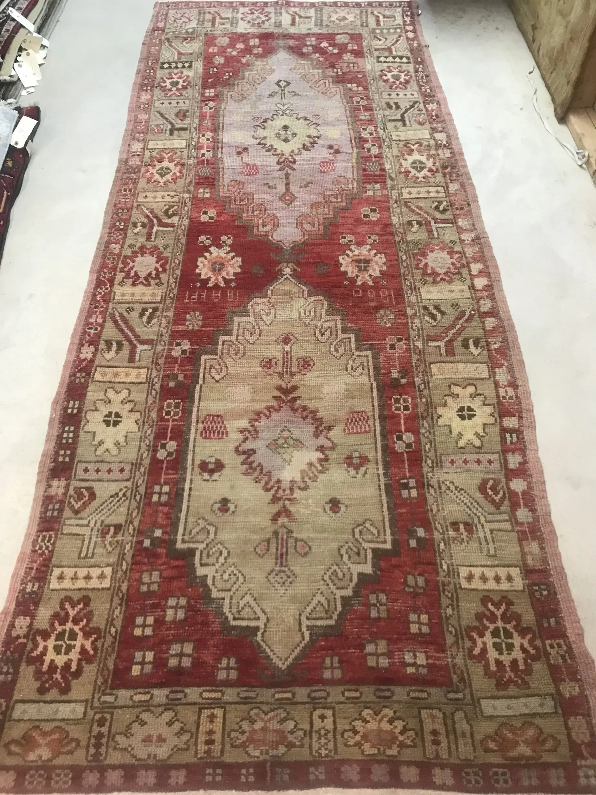 A rug with a detailed pattern on it.