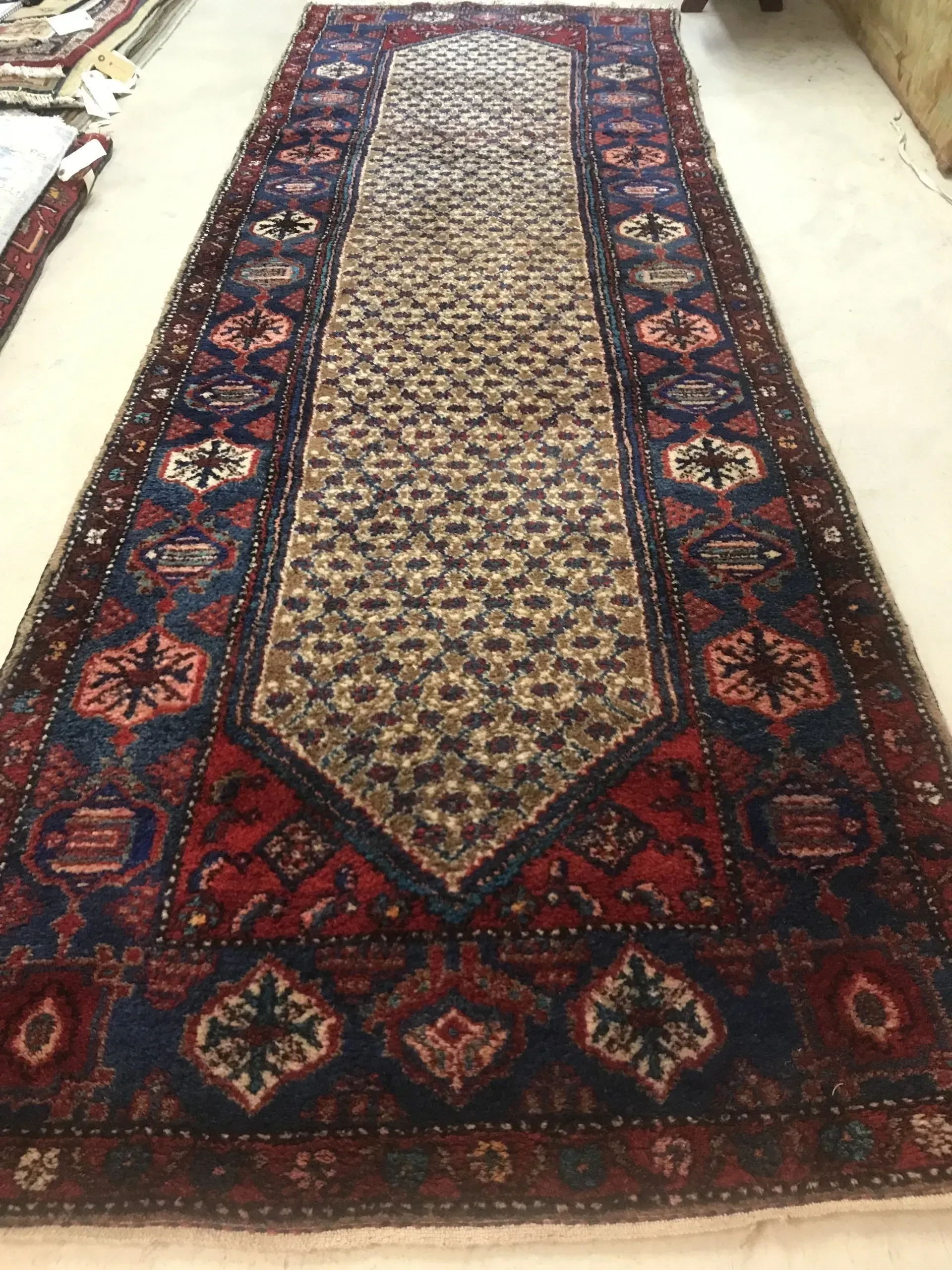 A rug with a detailed pattern on it.