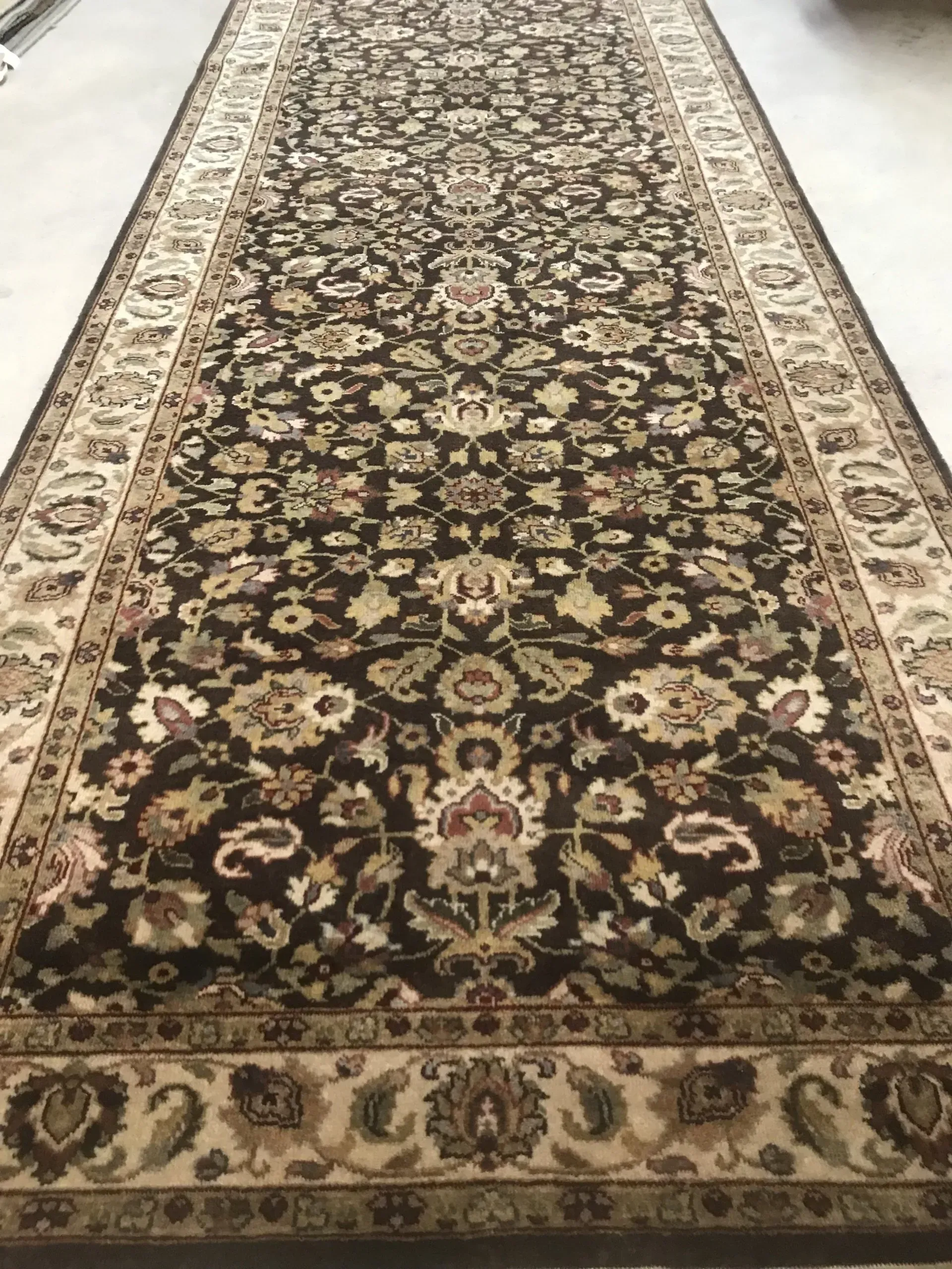 A rug with a detailed pattern on it.