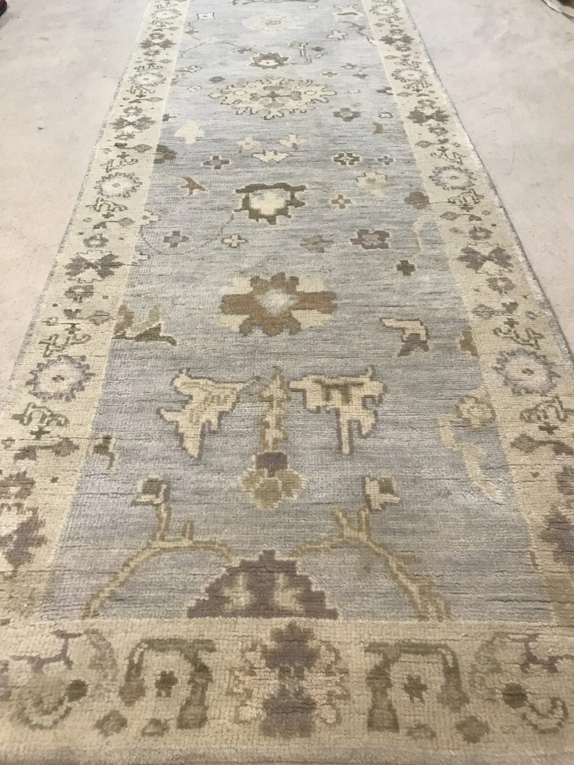 A rug with a detailed pattern on it.