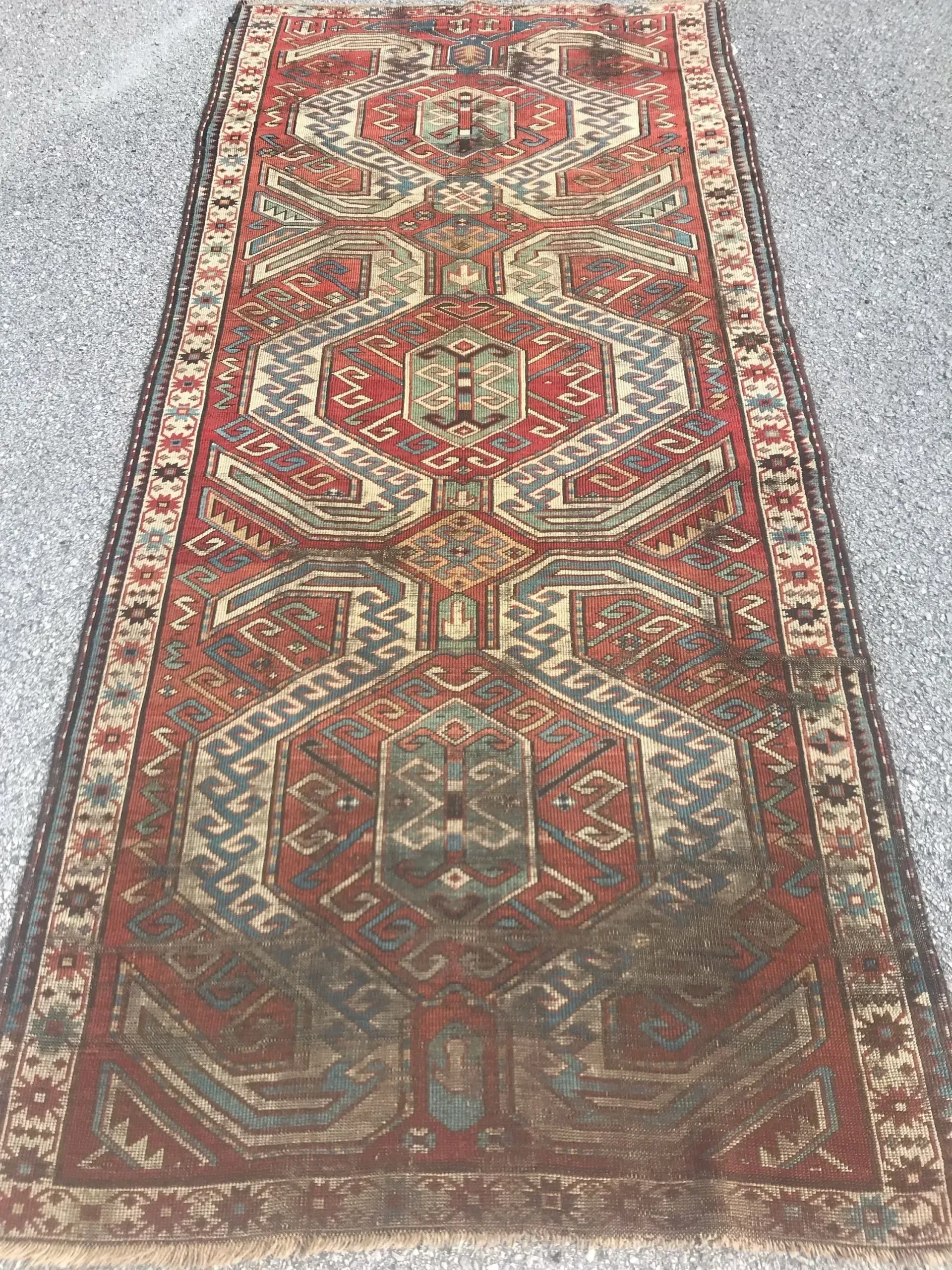 A rug with a detailed pattern on it.