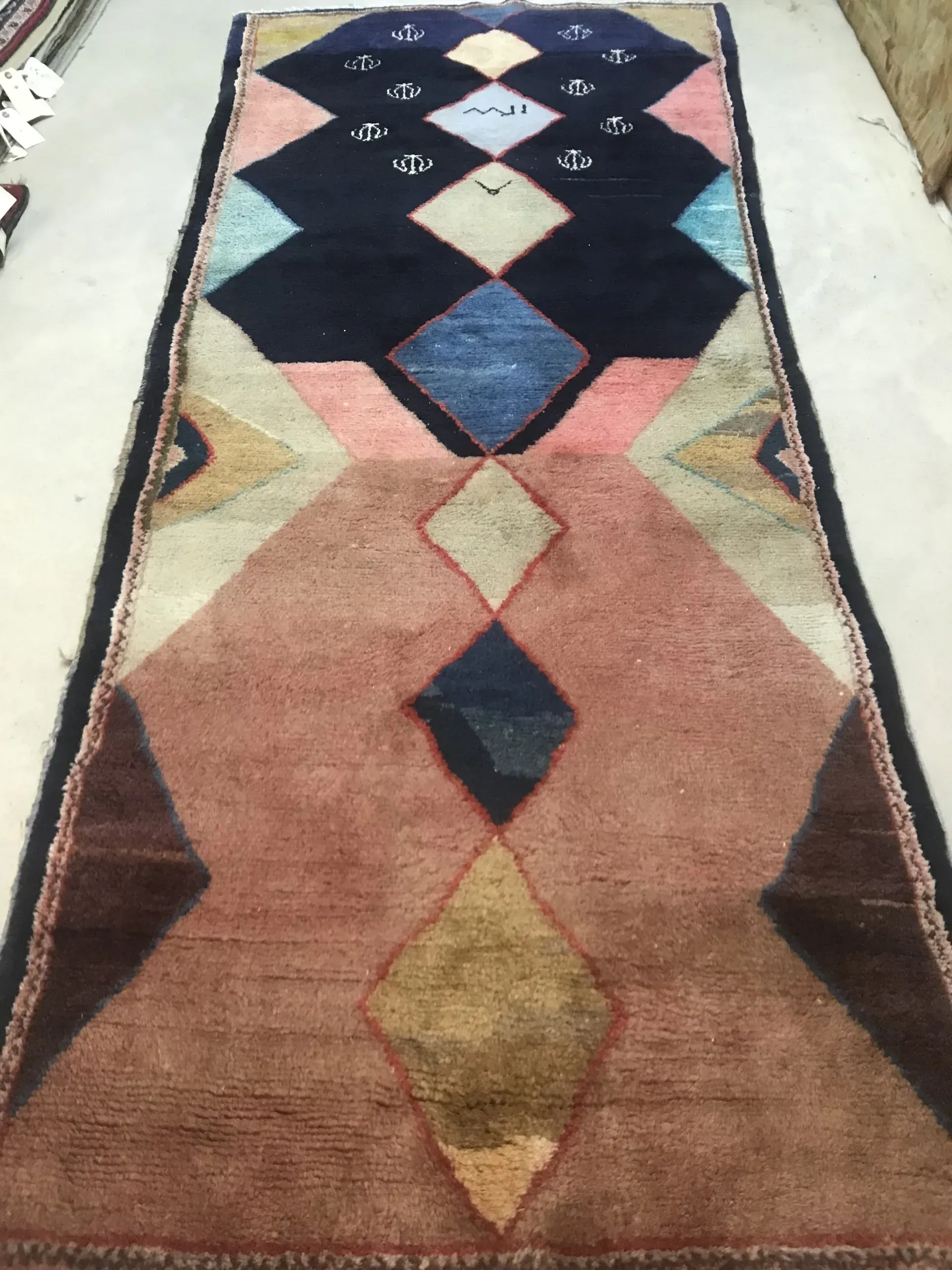 A rug with a detailed pattern on it.