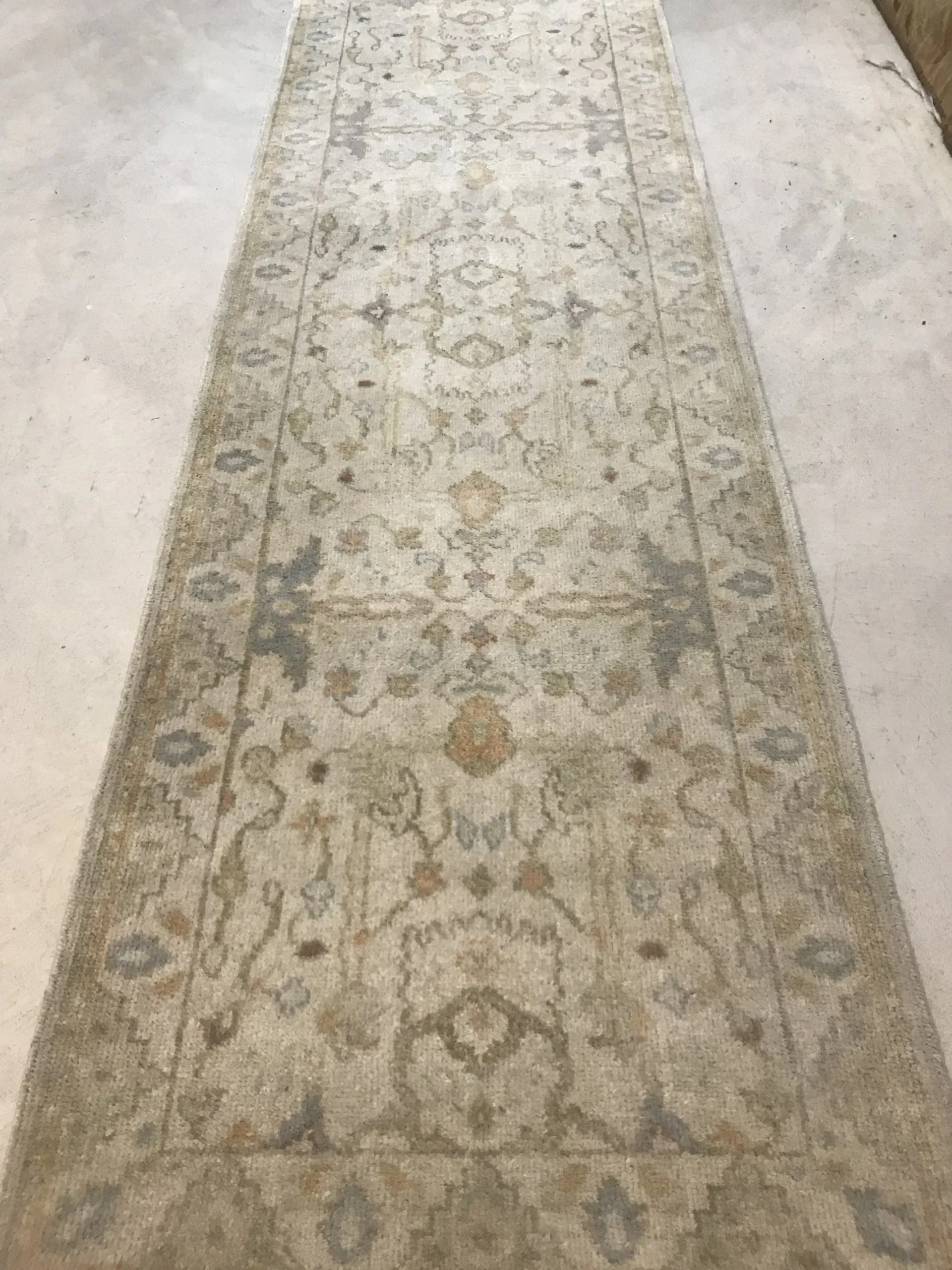 A rug with a detailed pattern on it.