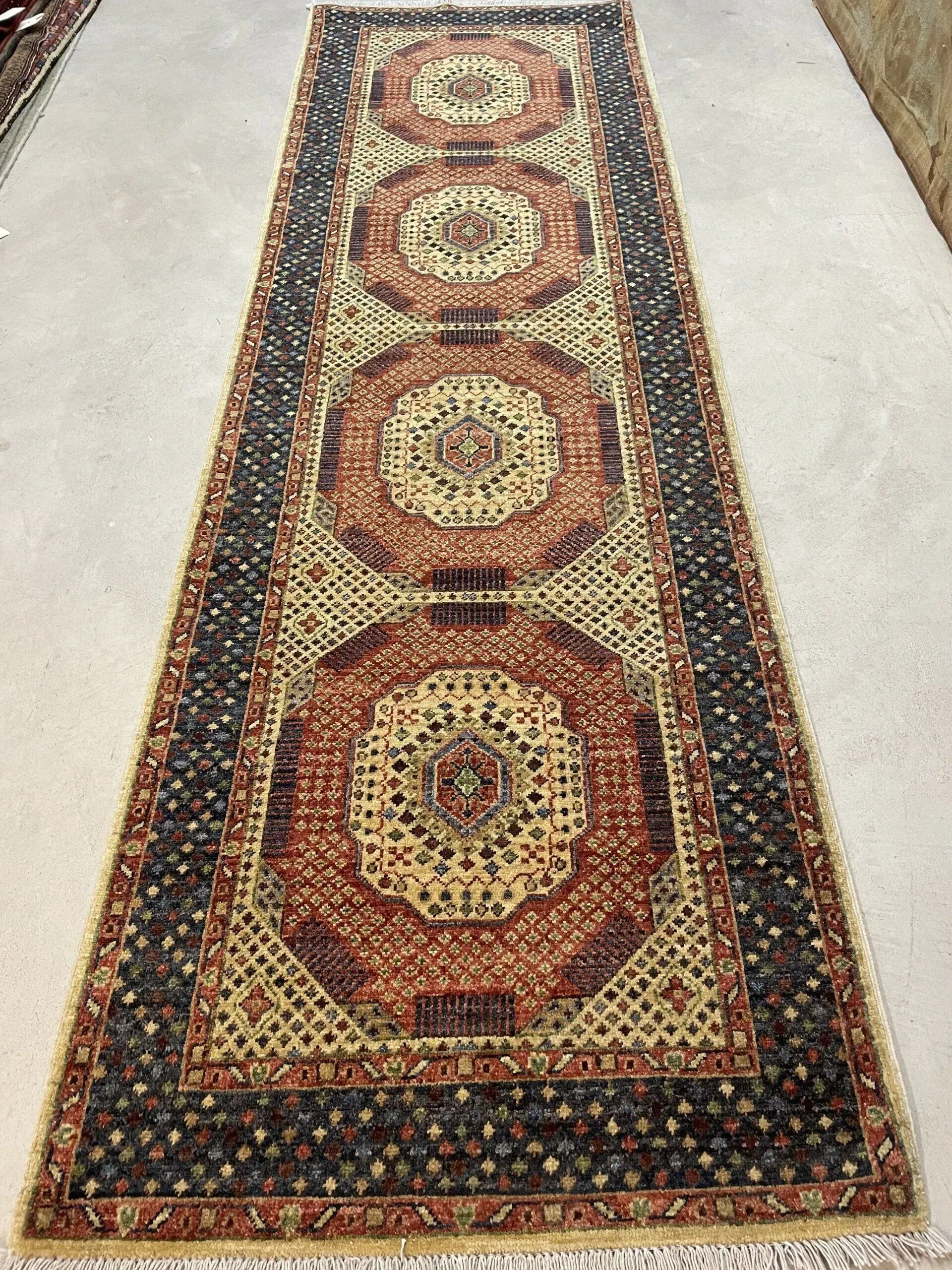 A rug with a detailed pattern on it.