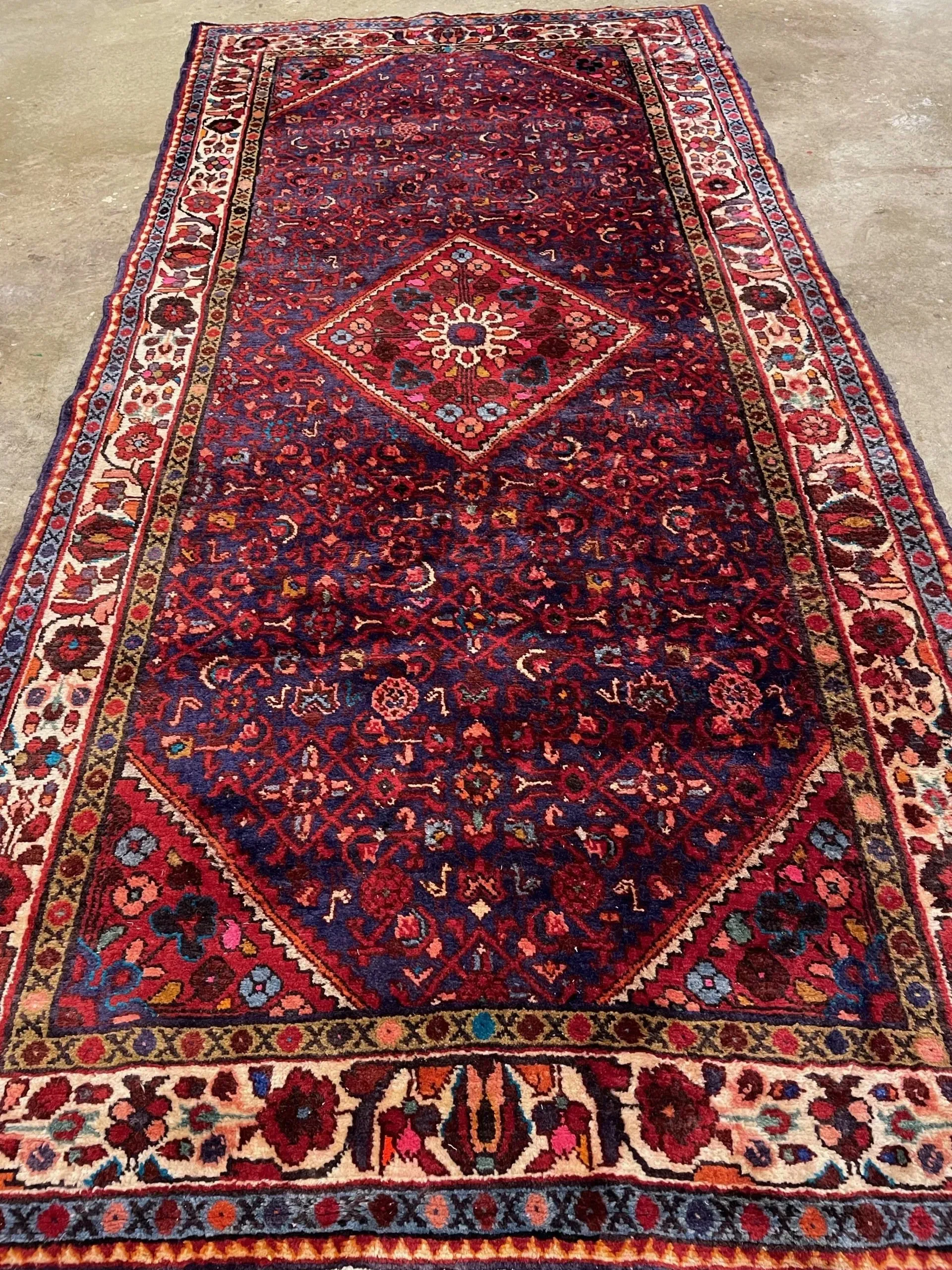 A rug with a detailed pattern on it.