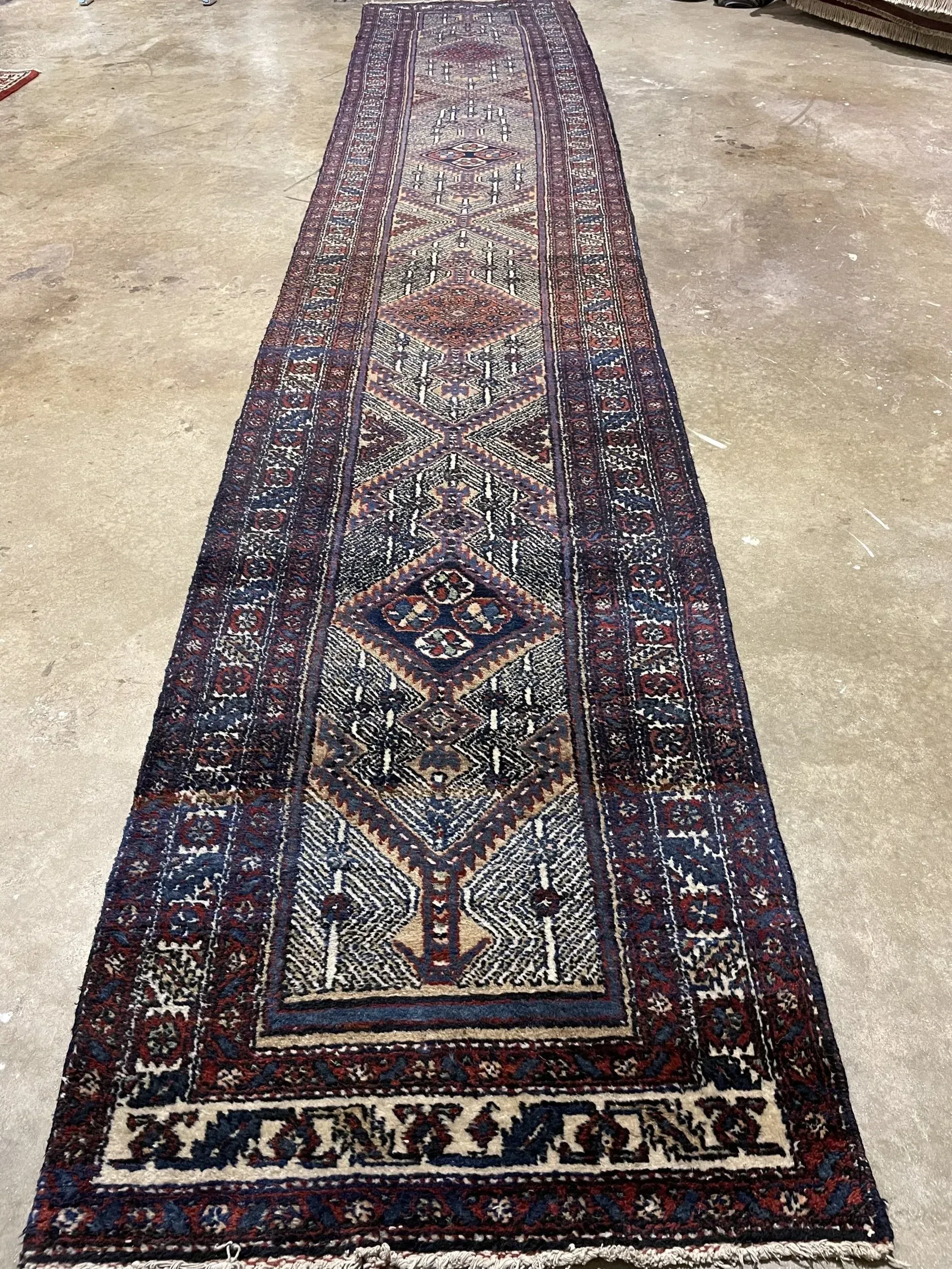 A rug with a detailed pattern on it.