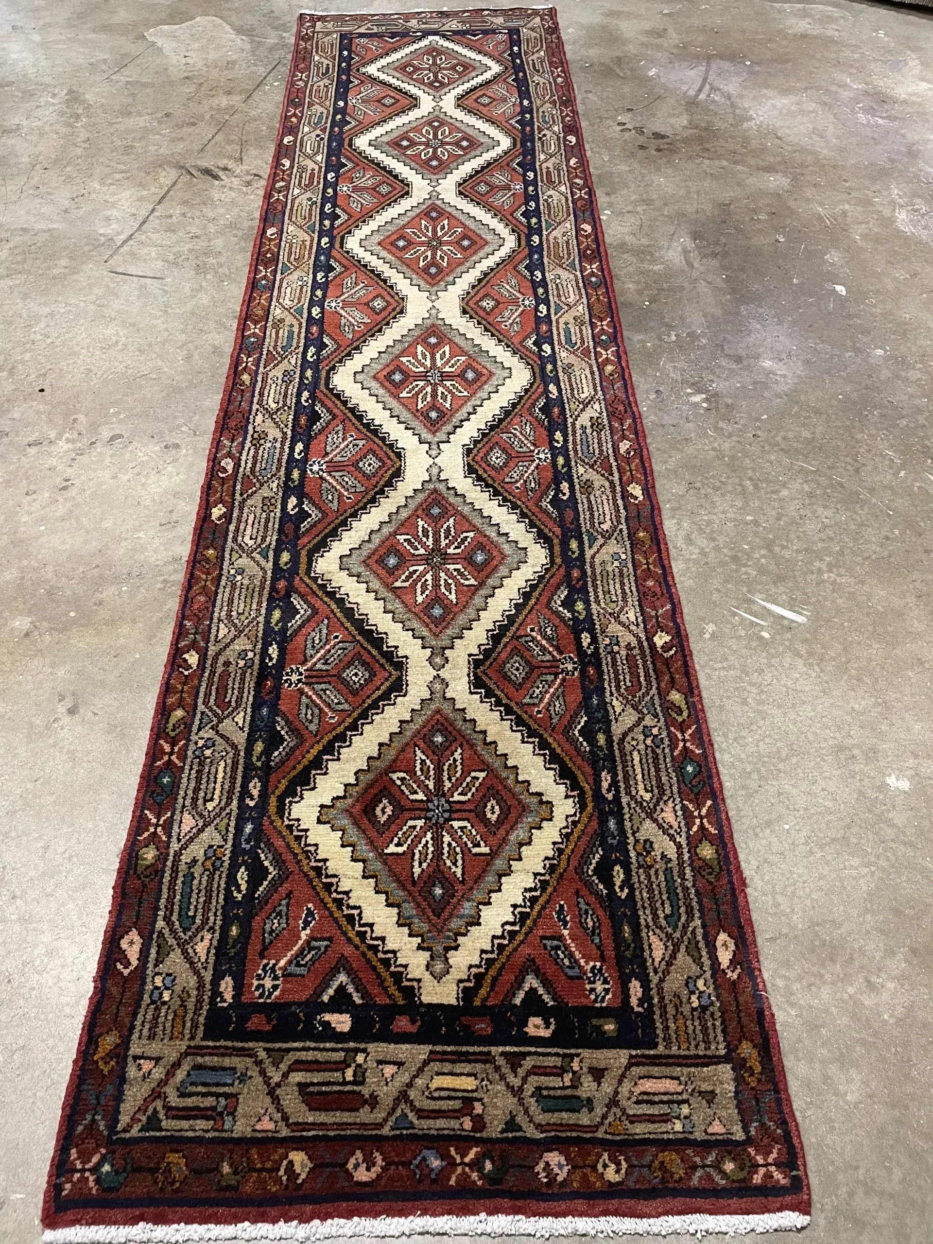 A rug with a detailed pattern on it.