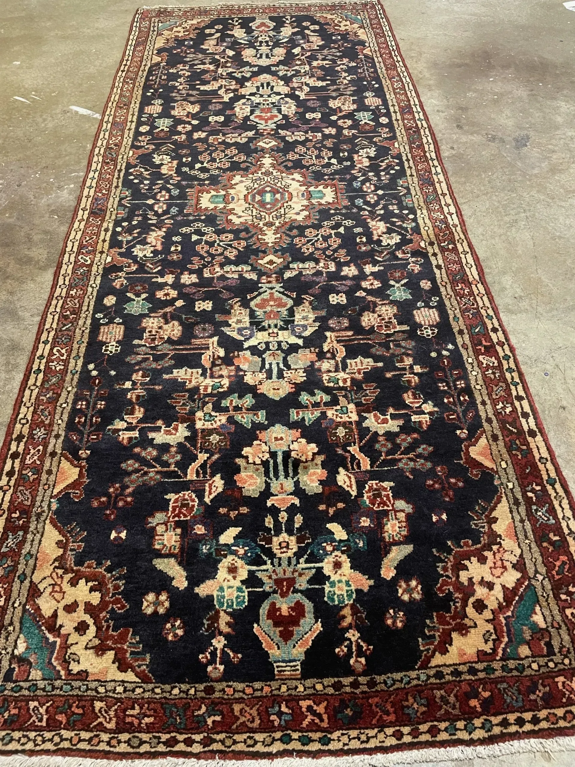 A rug with a detailed pattern on it.