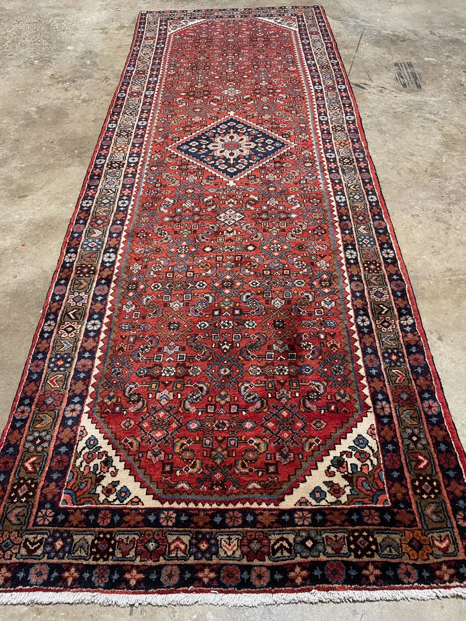 A rug with a detailed pattern on it.