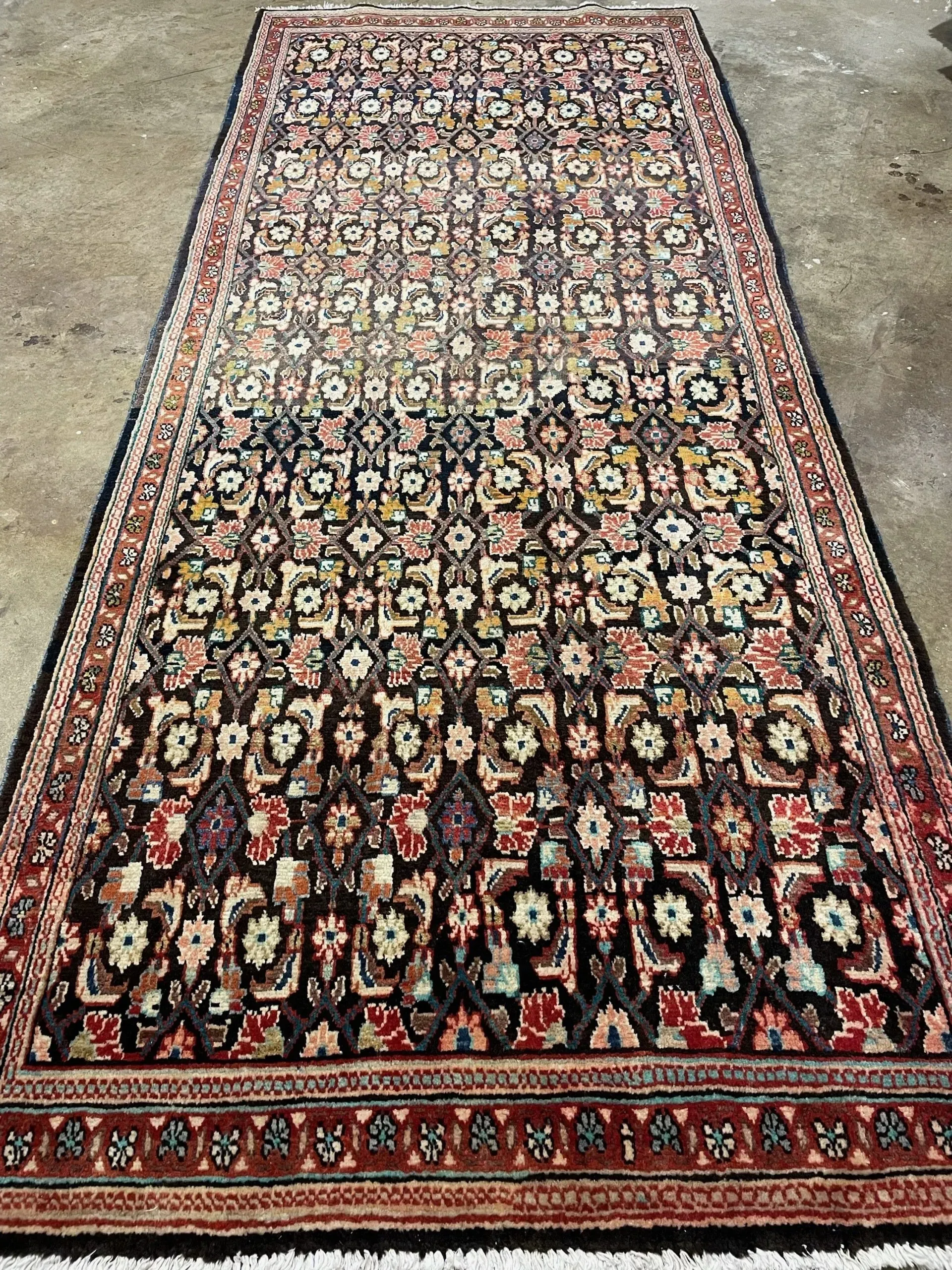 A rug with a detailed pattern on it.