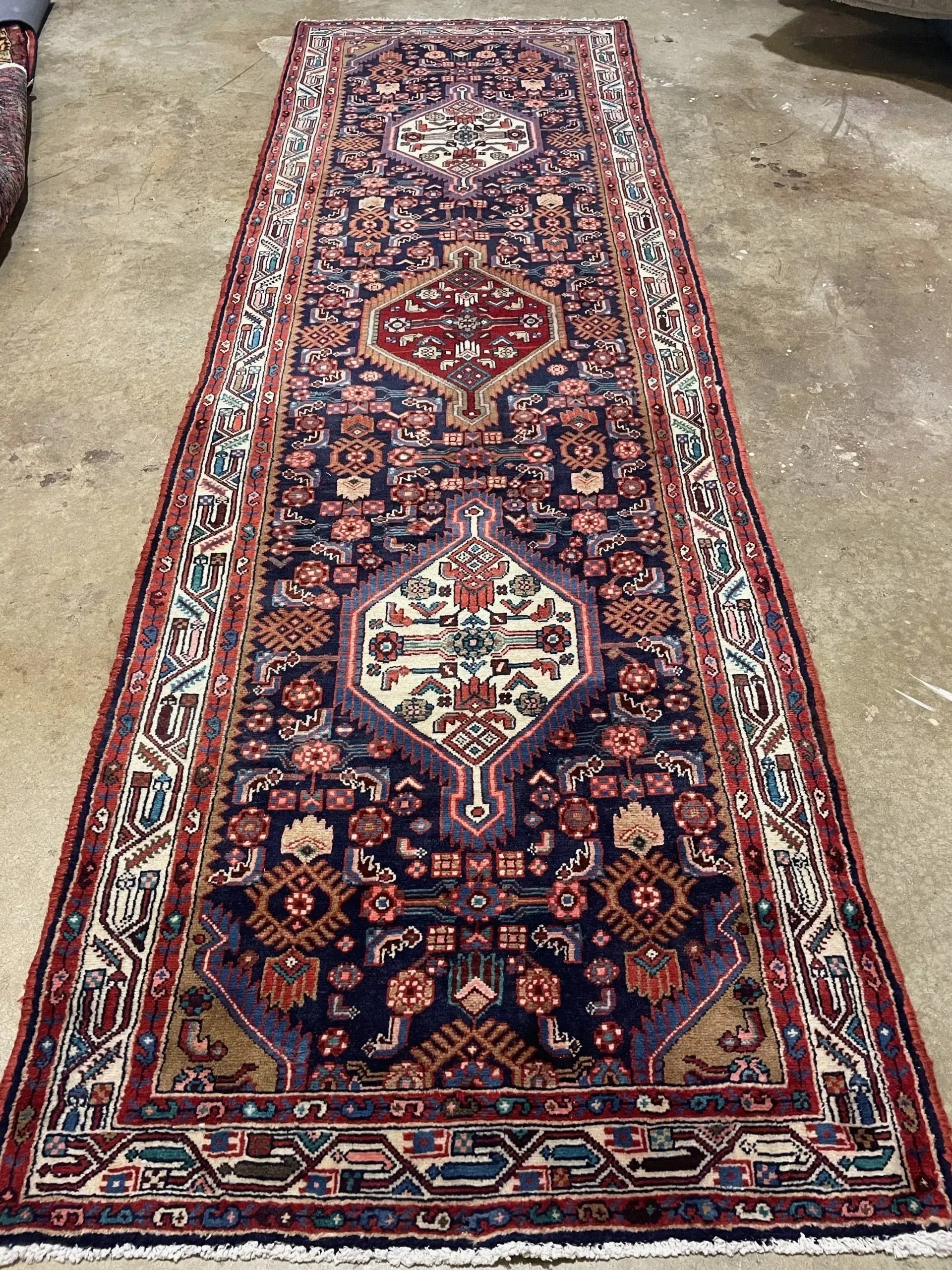A rug with a detailed pattern on it.