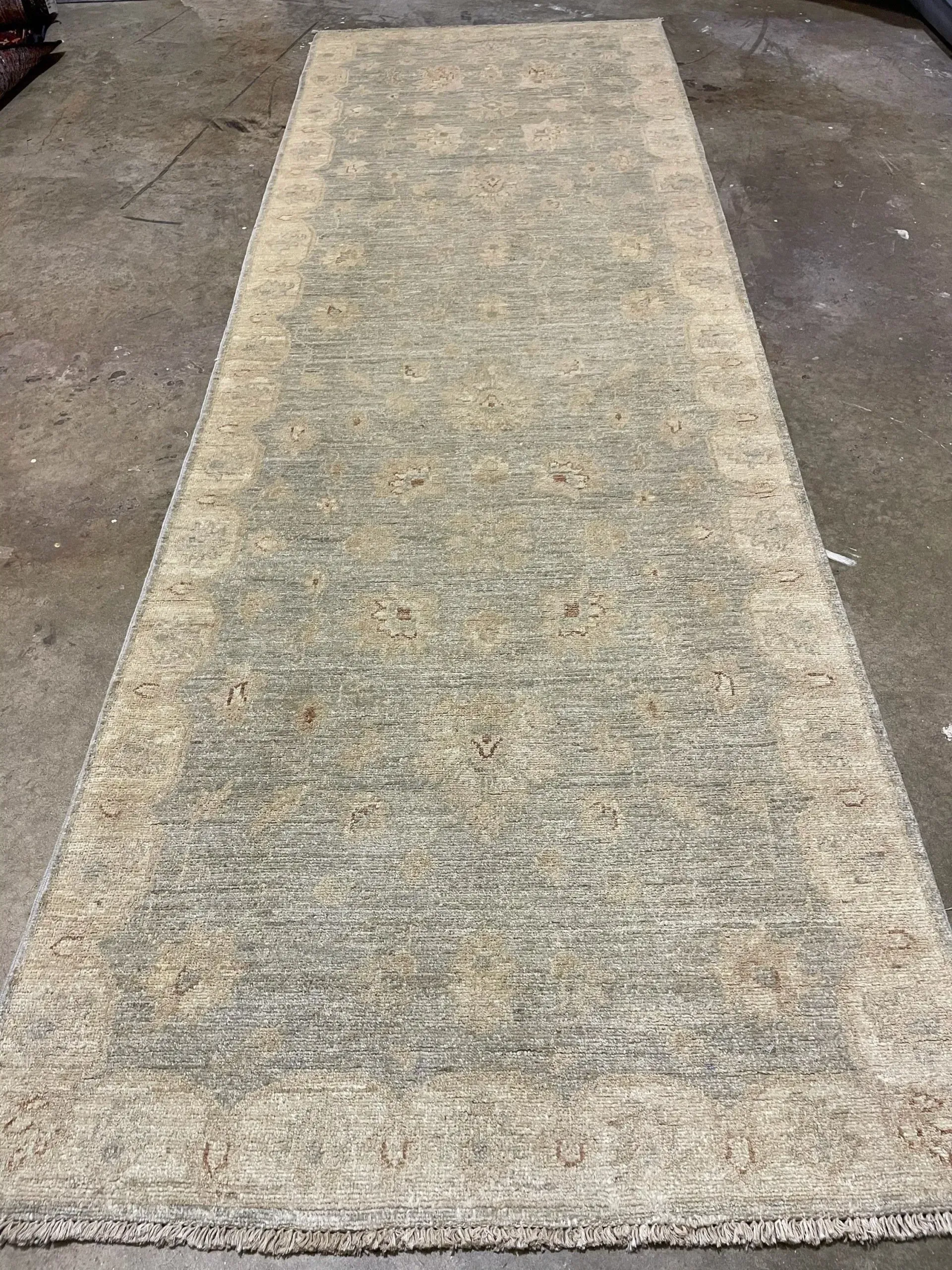 A rug with a detailed pattern on it.