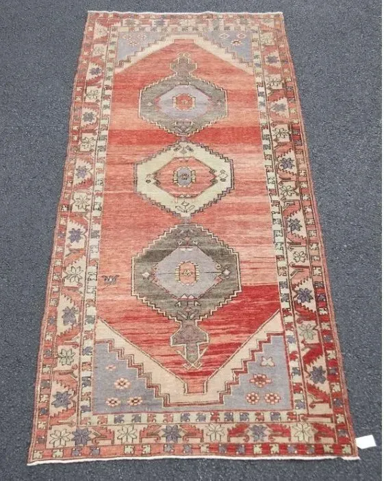 A rug with a detailed pattern on it.