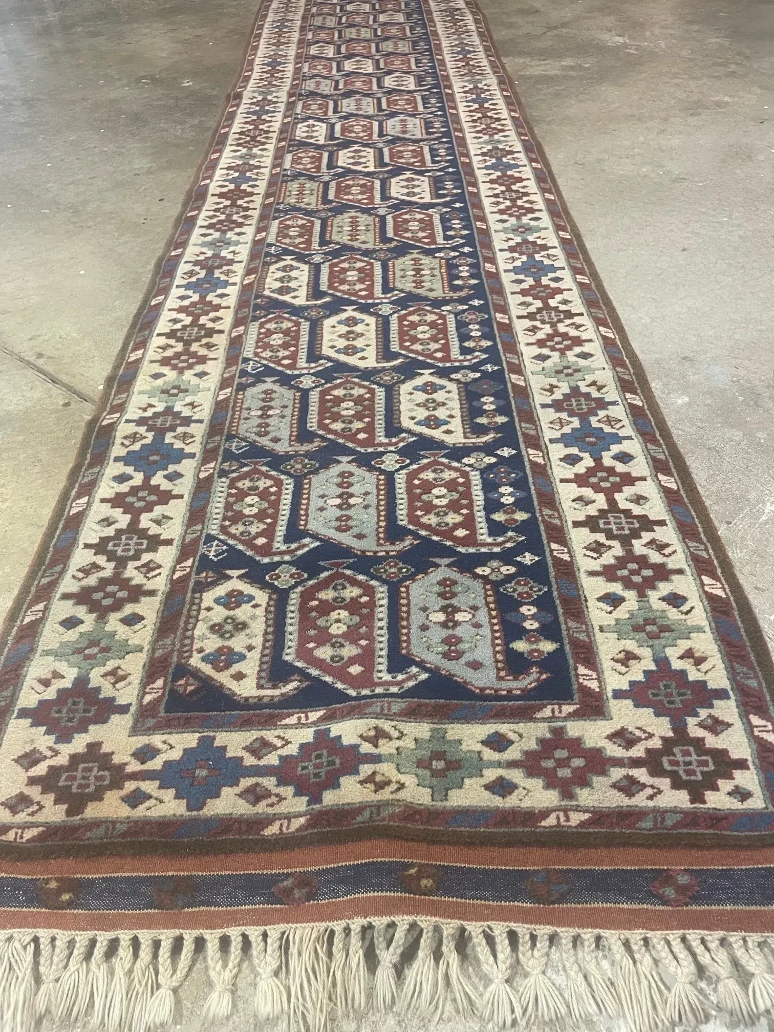 A rug with a detailed pattern on it.