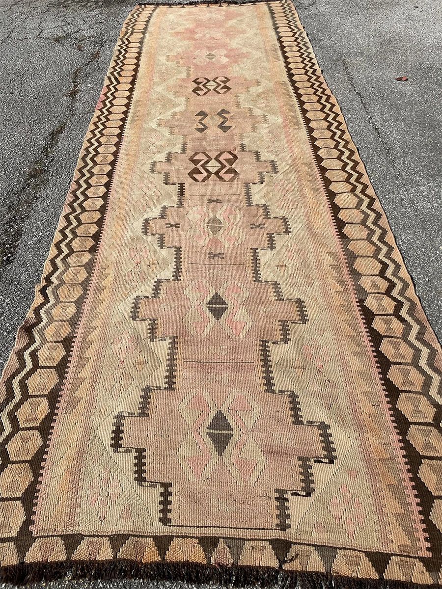 A rug with a detailed pattern on it.