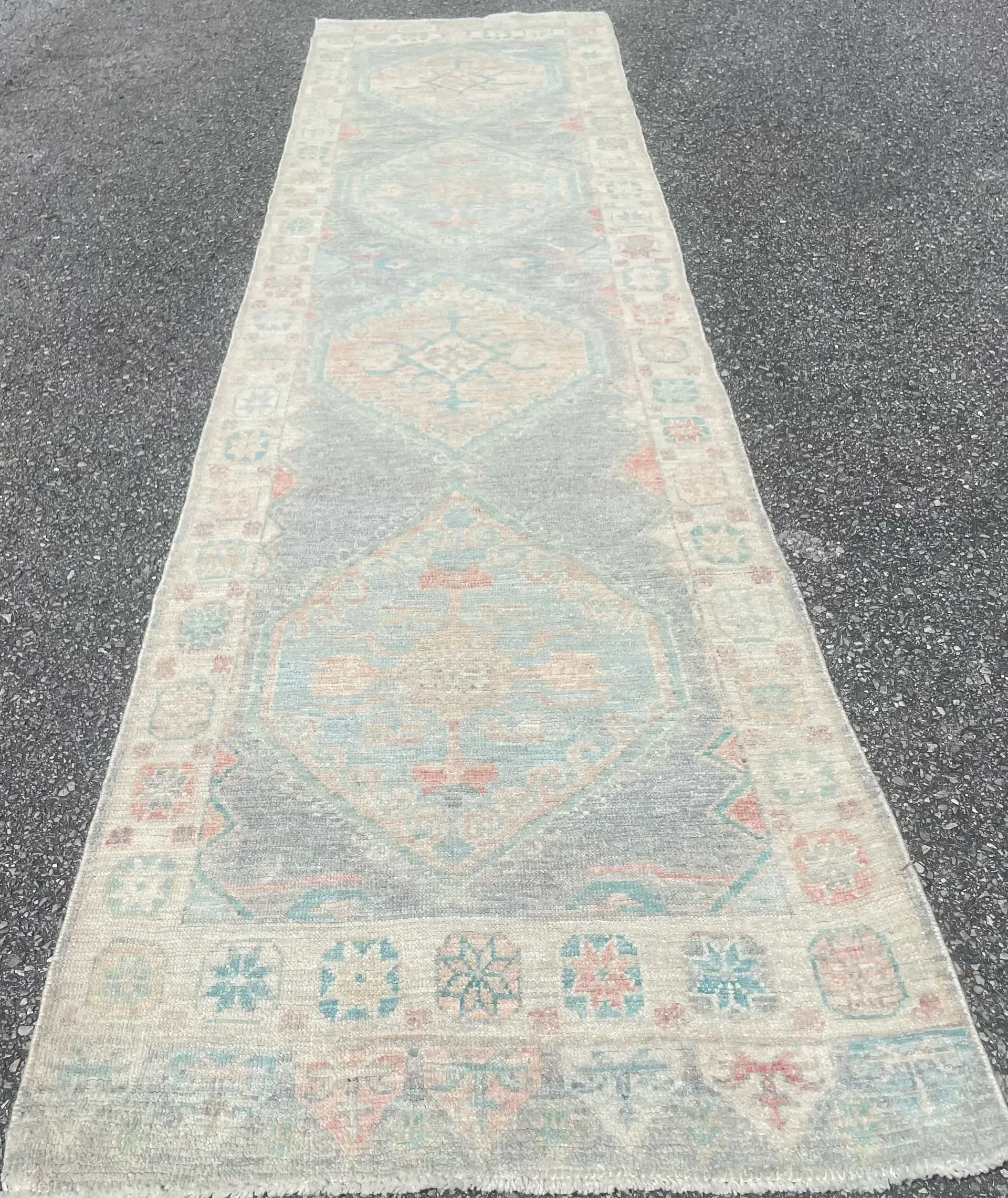 A rug with a detailed pattern on it.