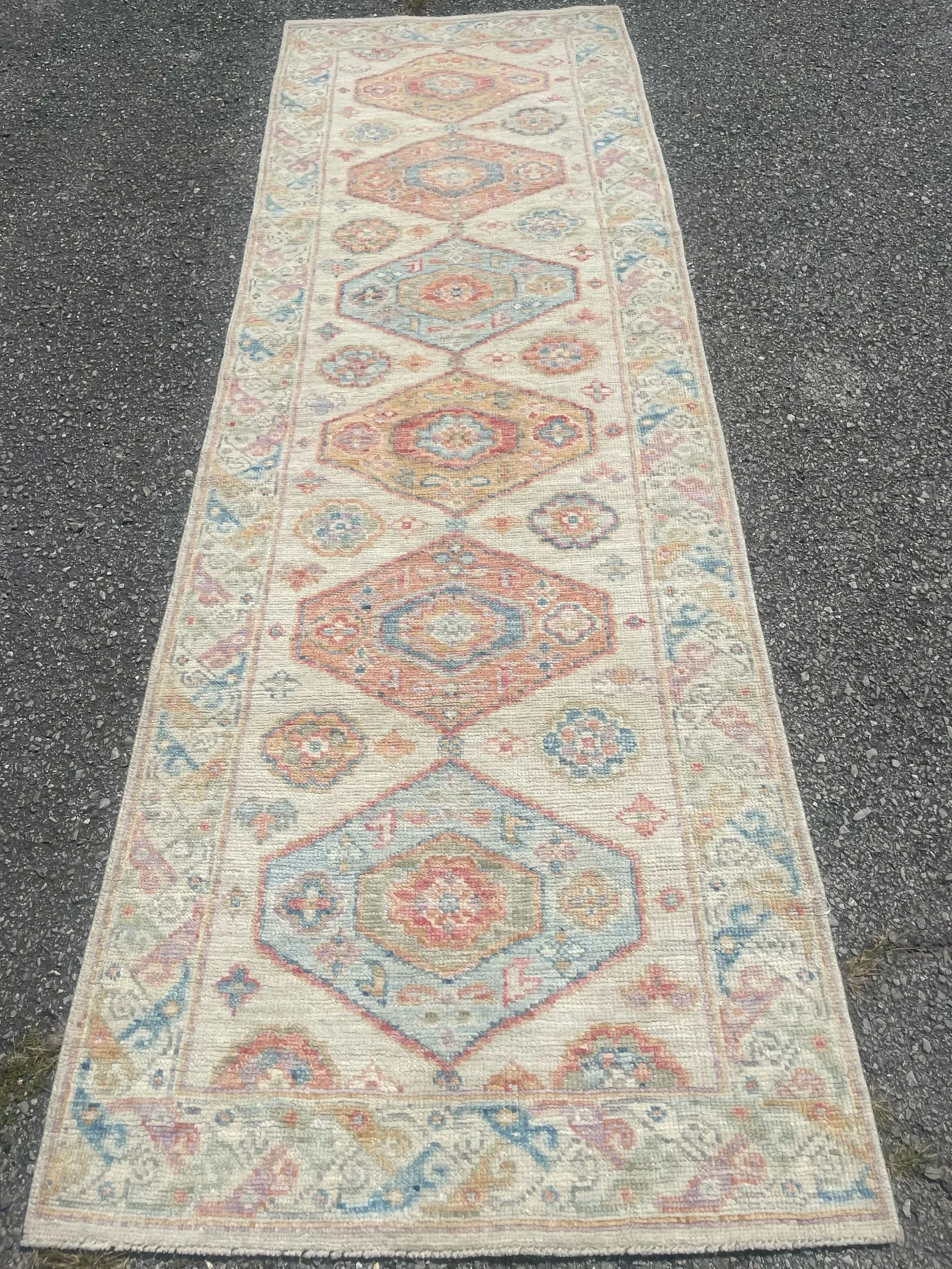 A rug with a detailed pattern on it.